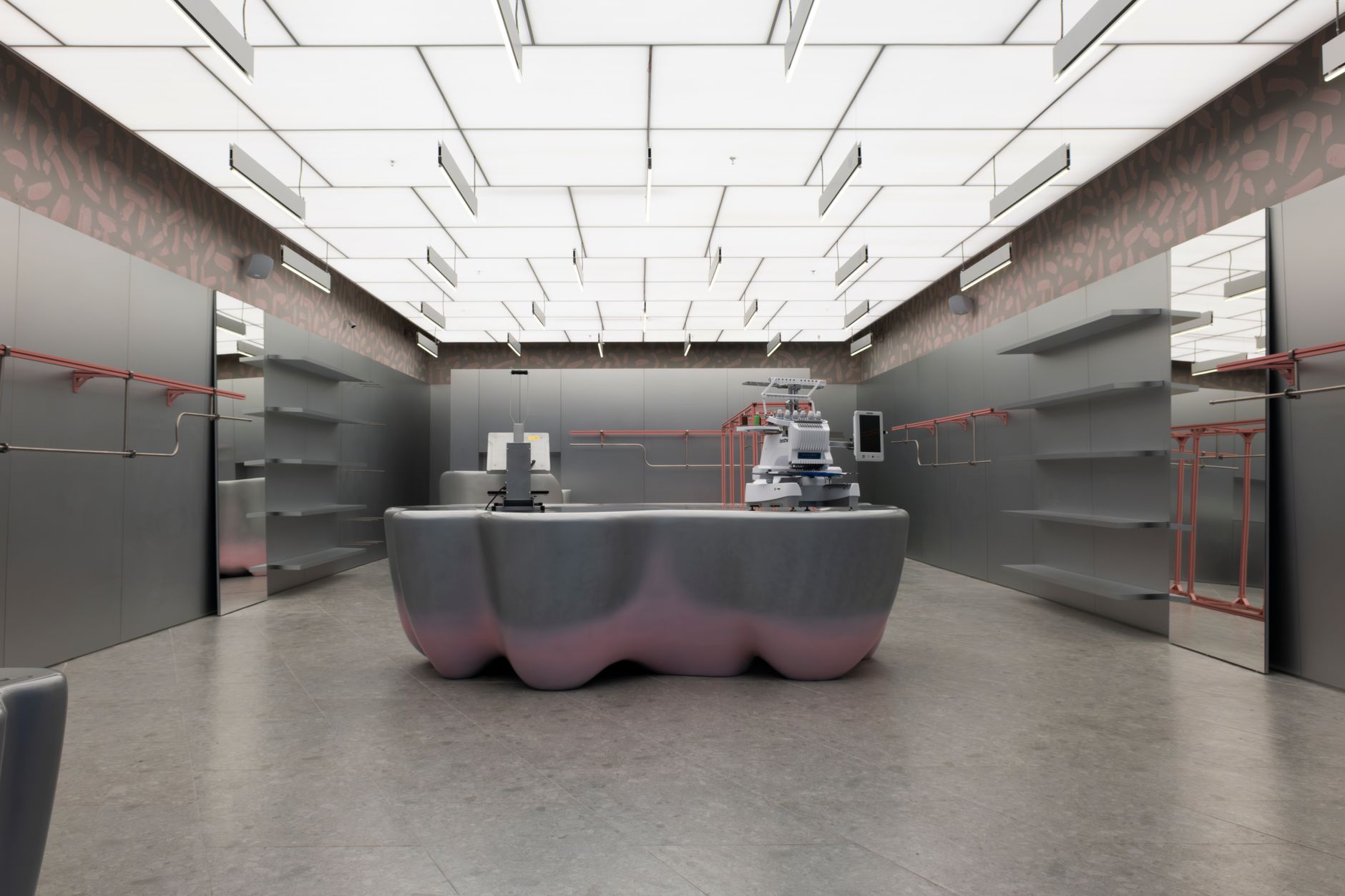 Explore the sleek, modern interior of a futuristic clothing store in Bursa, Turkey.