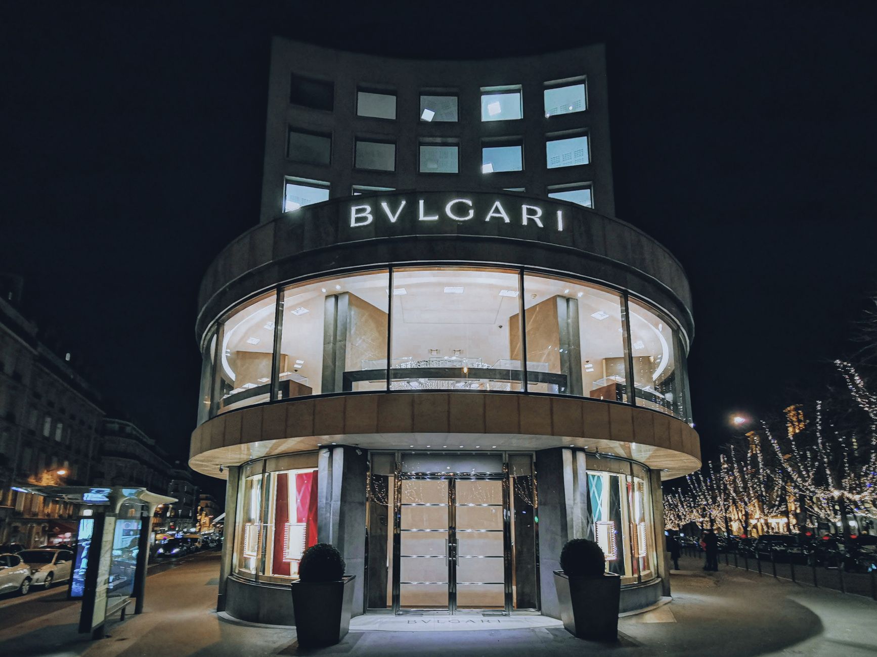 Elegant Bulgari storefront illuminated at night, capturing the essence of luxury in Paris.