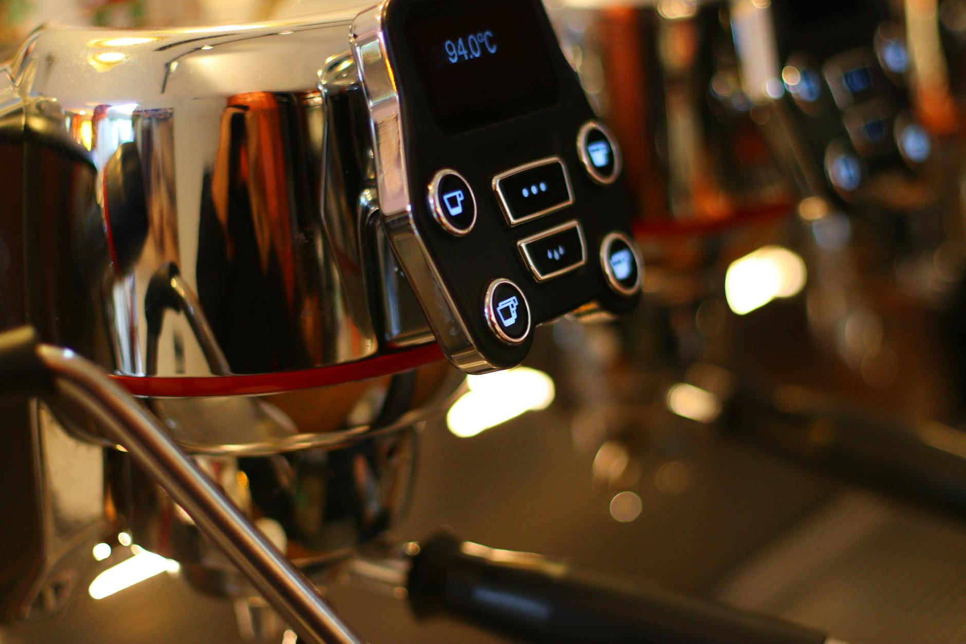 High-quality close-up shot of a modern espresso machine display showing temperature settings.