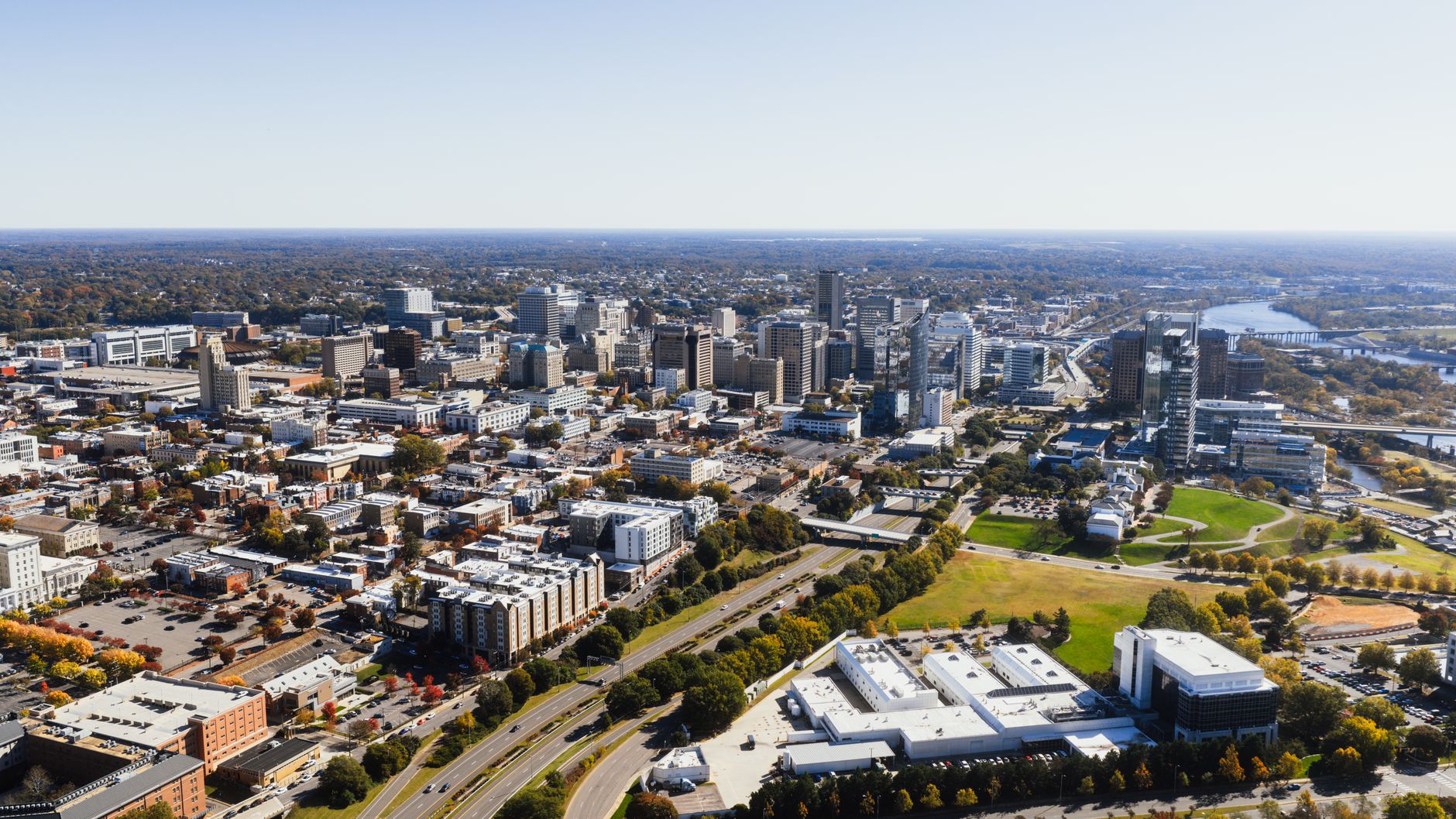 Aerial view of downtown Richmond, Virginia capturing the skyline and surroundings on a clear day.