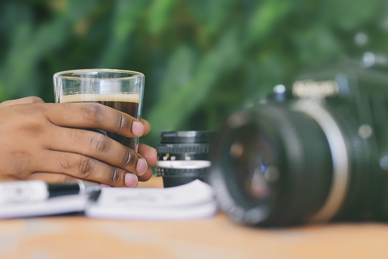 coffee, cup, espresso, drink, pause, caffeine, hand, picture, objective, slr, retro, vintage, device, book, pen, hobbies, bokeh, coffee cup, blur, colors, colorful