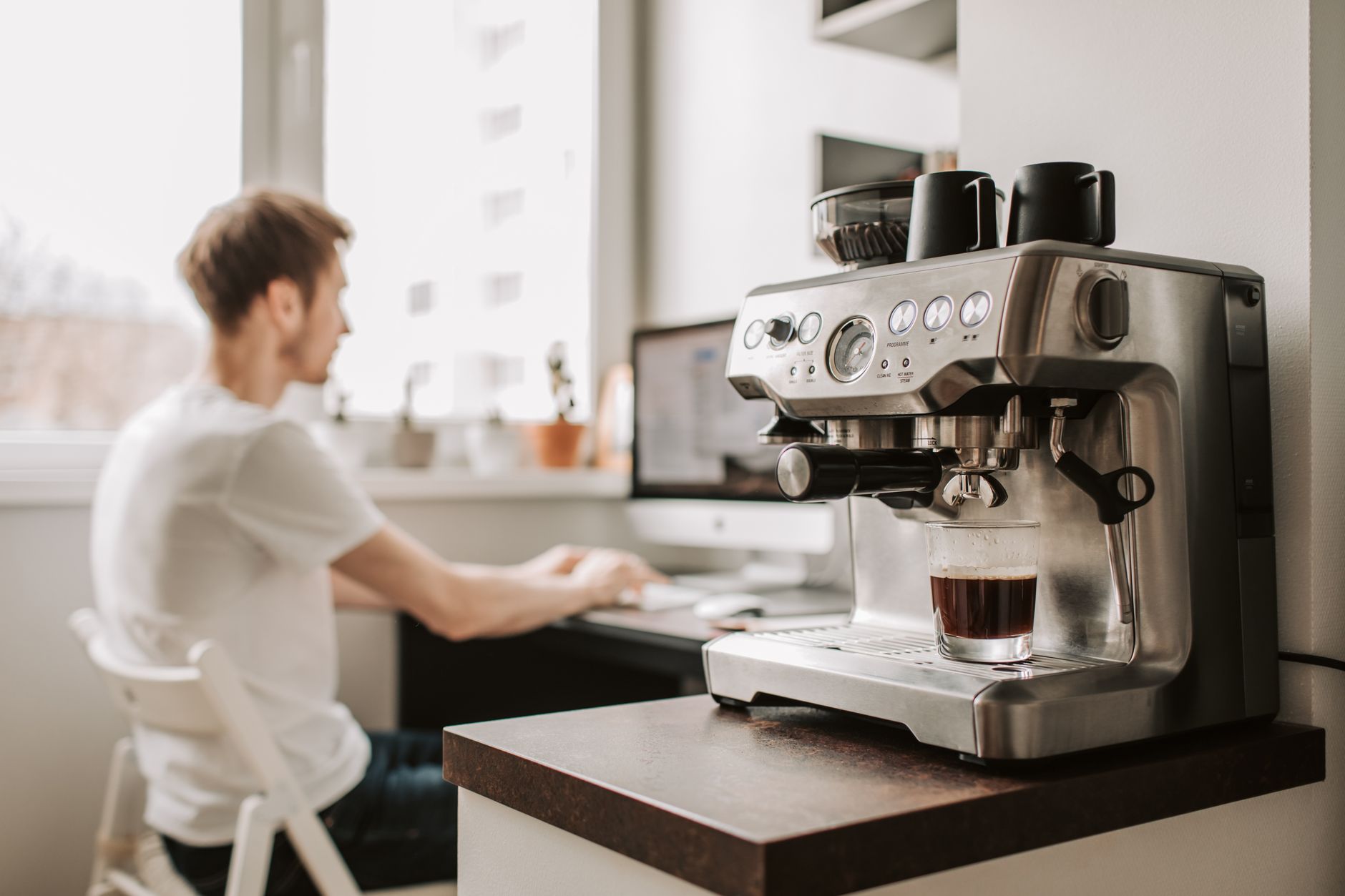 Commercial espresso machine in professional office setting