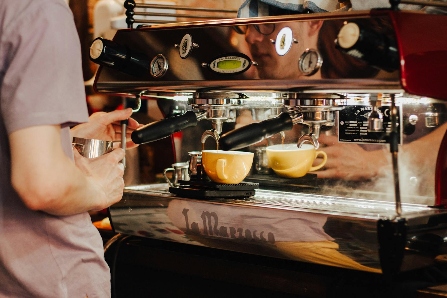 Busy Tampa office coffee station with modern machines
