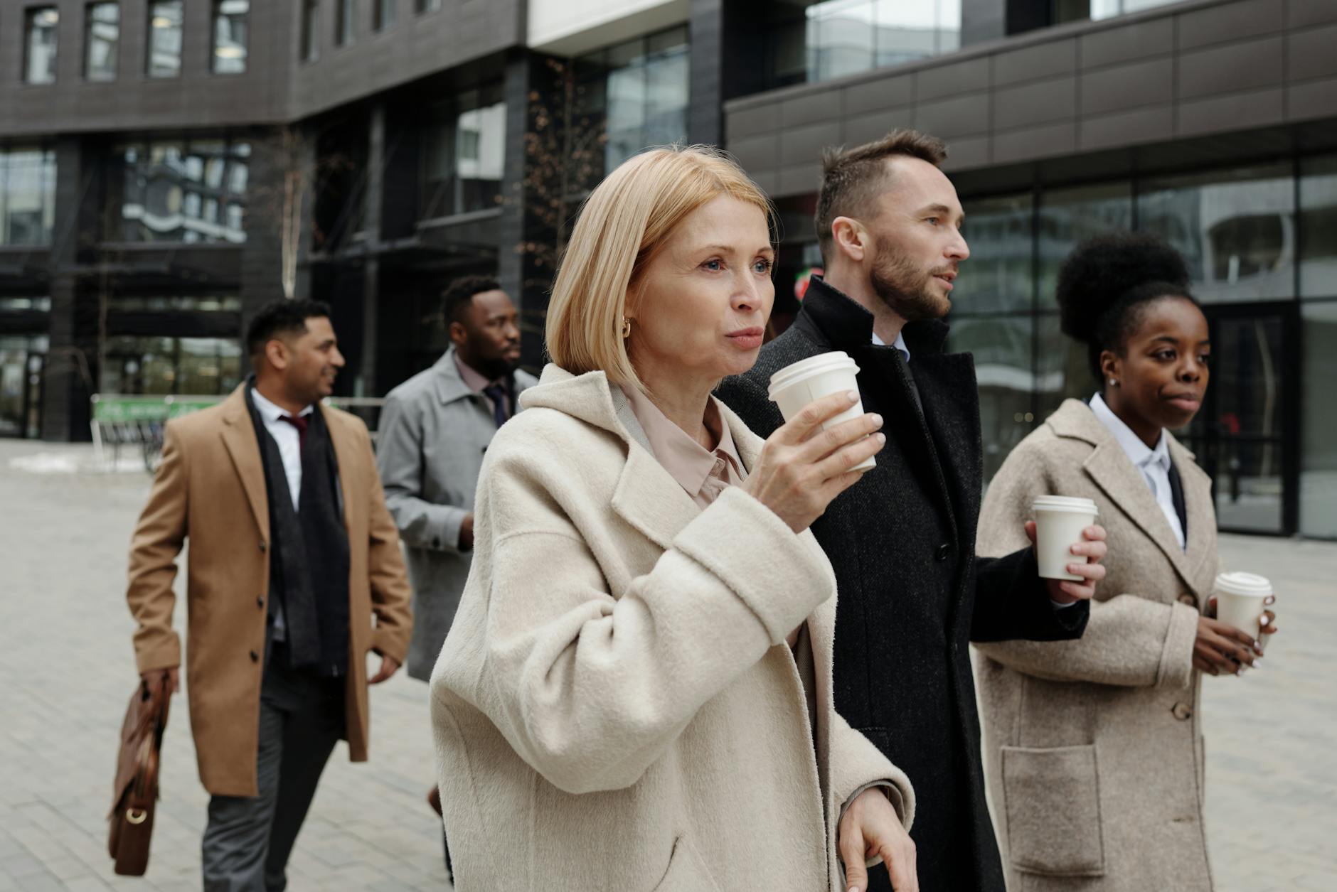 Busy professionals taking coffee break in Durham NC office