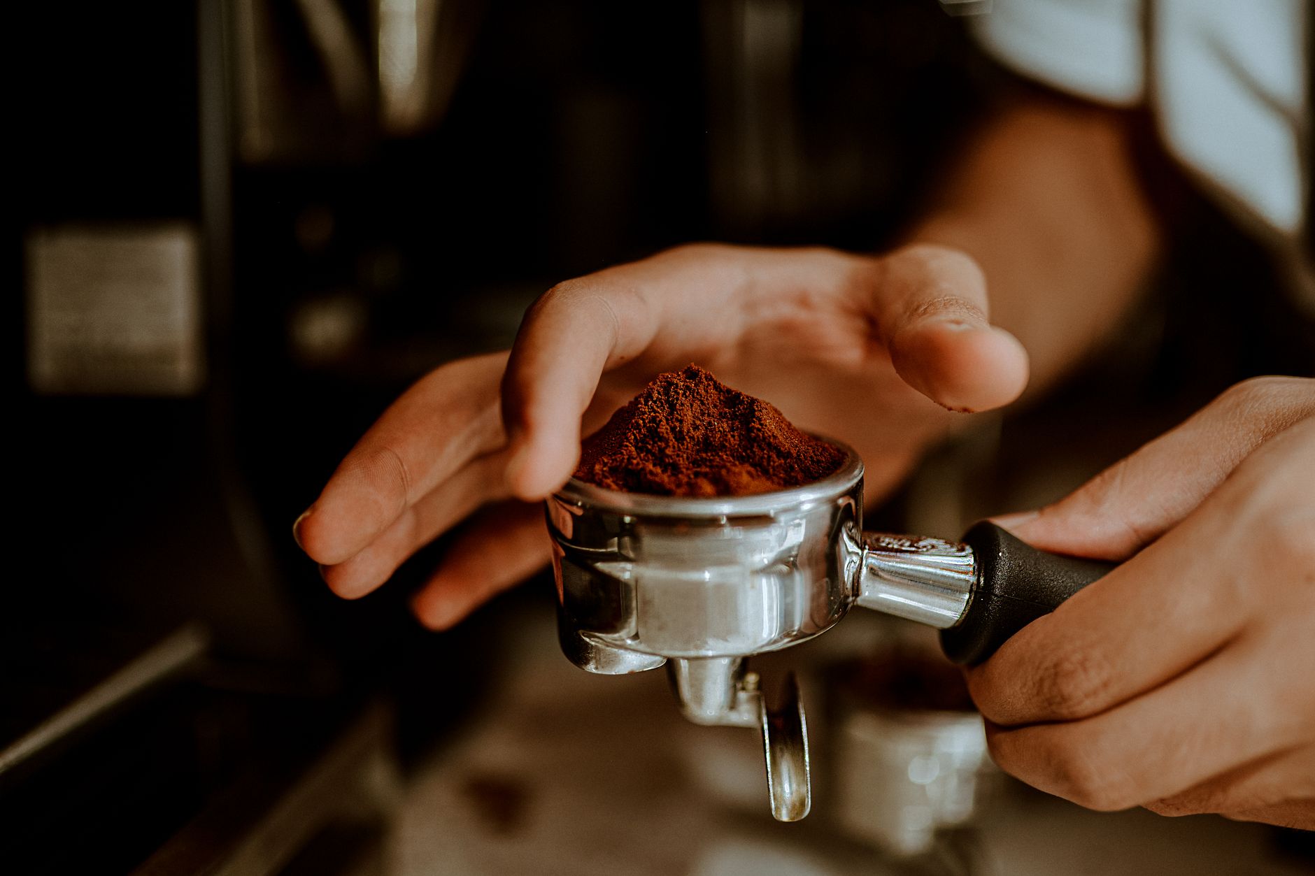 Perfectly formed espresso crema achieved with professional tamping technique