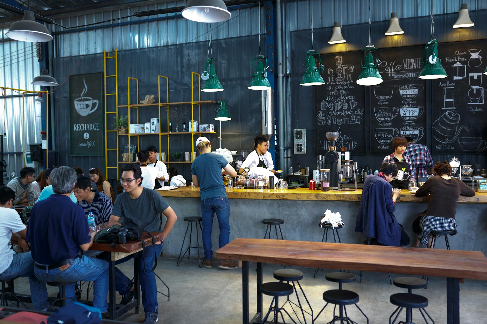 Patrons in Orlando restaurant enjoying specialty coffee