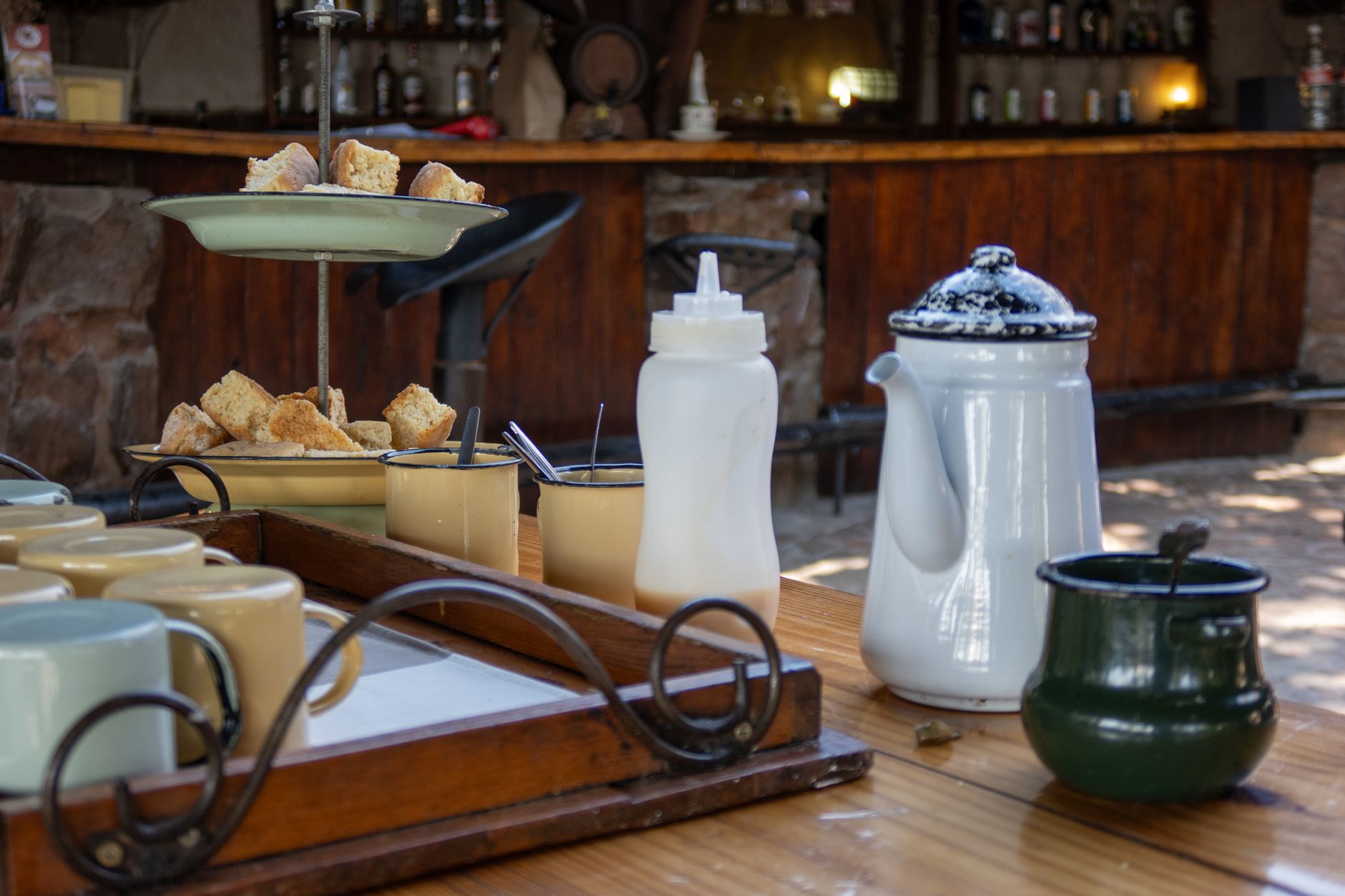 Professional coffee station in a contemporary office setting with barista preparing drinks