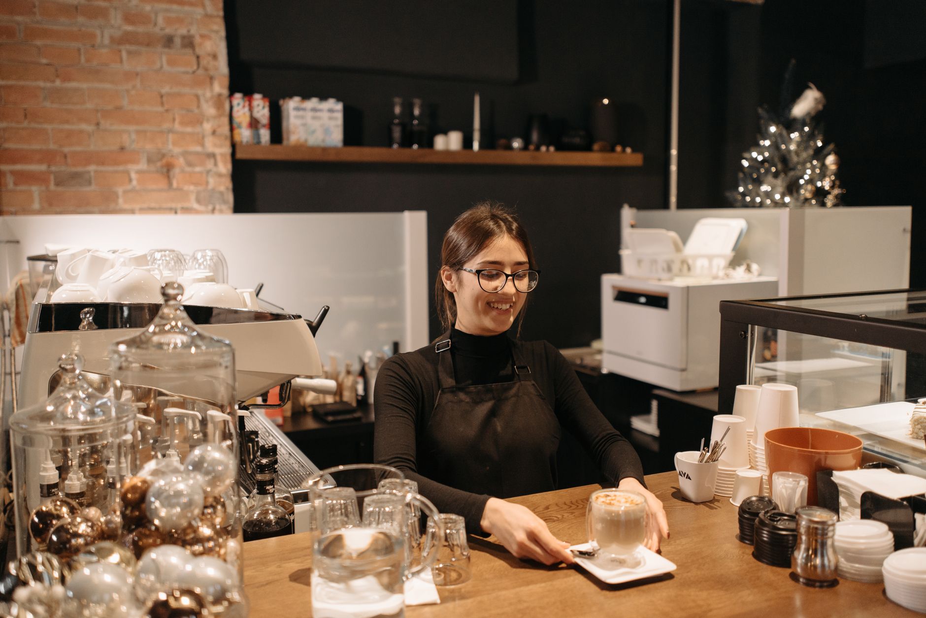 Close-up of espresso extraction with rich crema