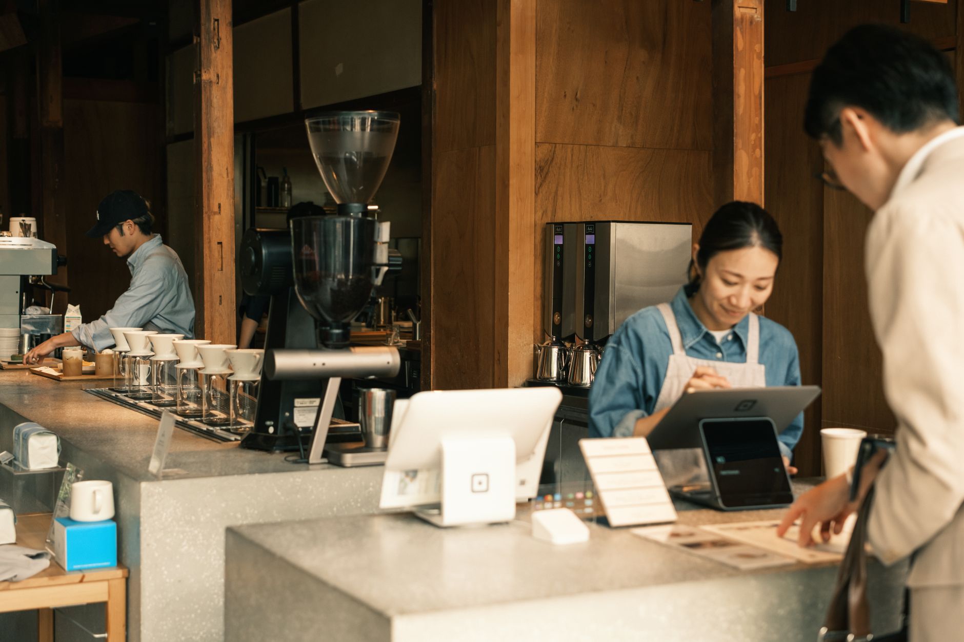 Upscale hotel lobby coffee service with professional equipment