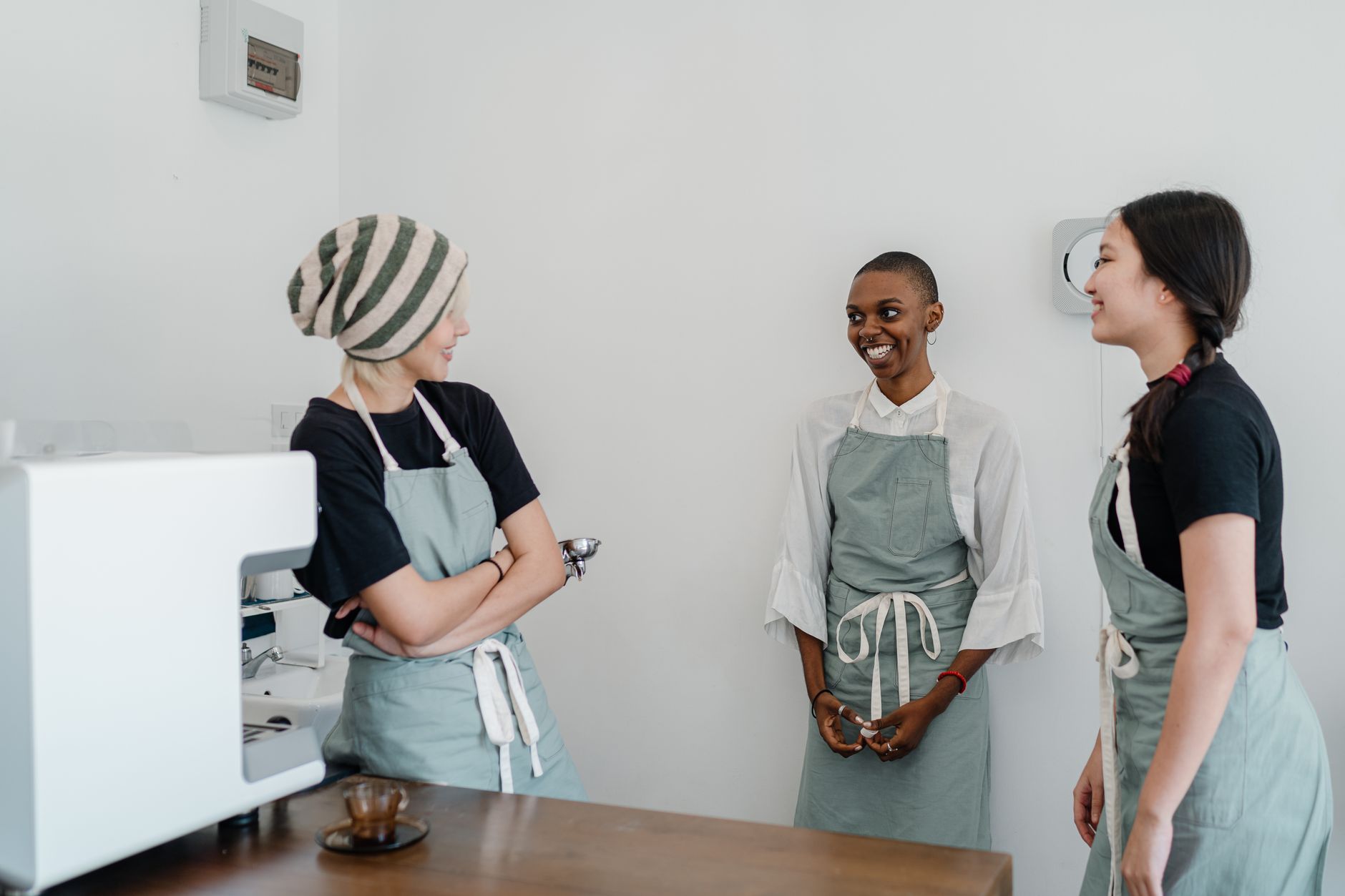 Barista training session for staff in a retirement community coffee station, 2026