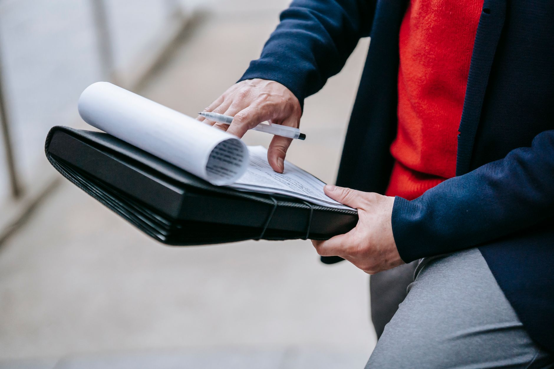 Business owner reviewing coffee equipment lease terms with financial advisor