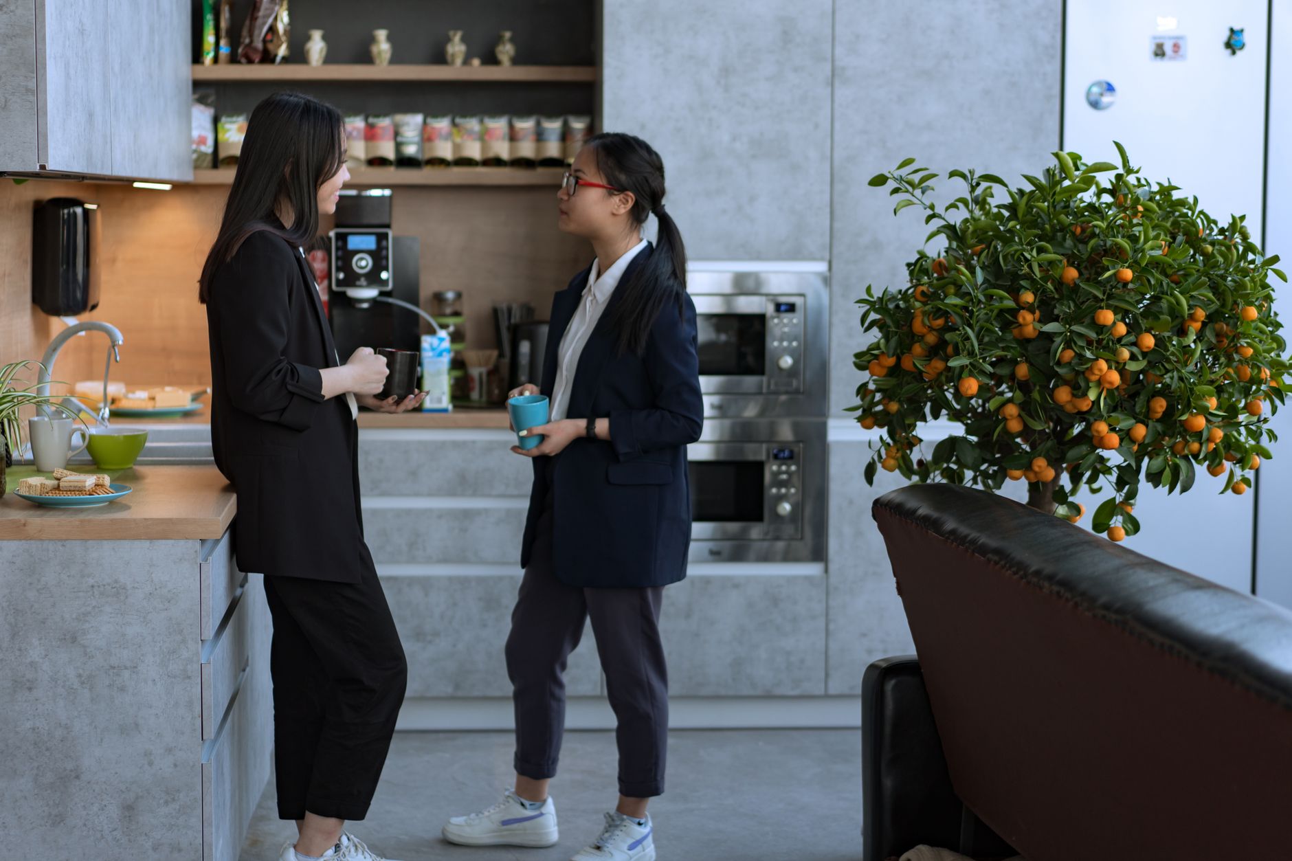 Modern office break room in San Diego with a professional coffee station featuring SENSA equipment