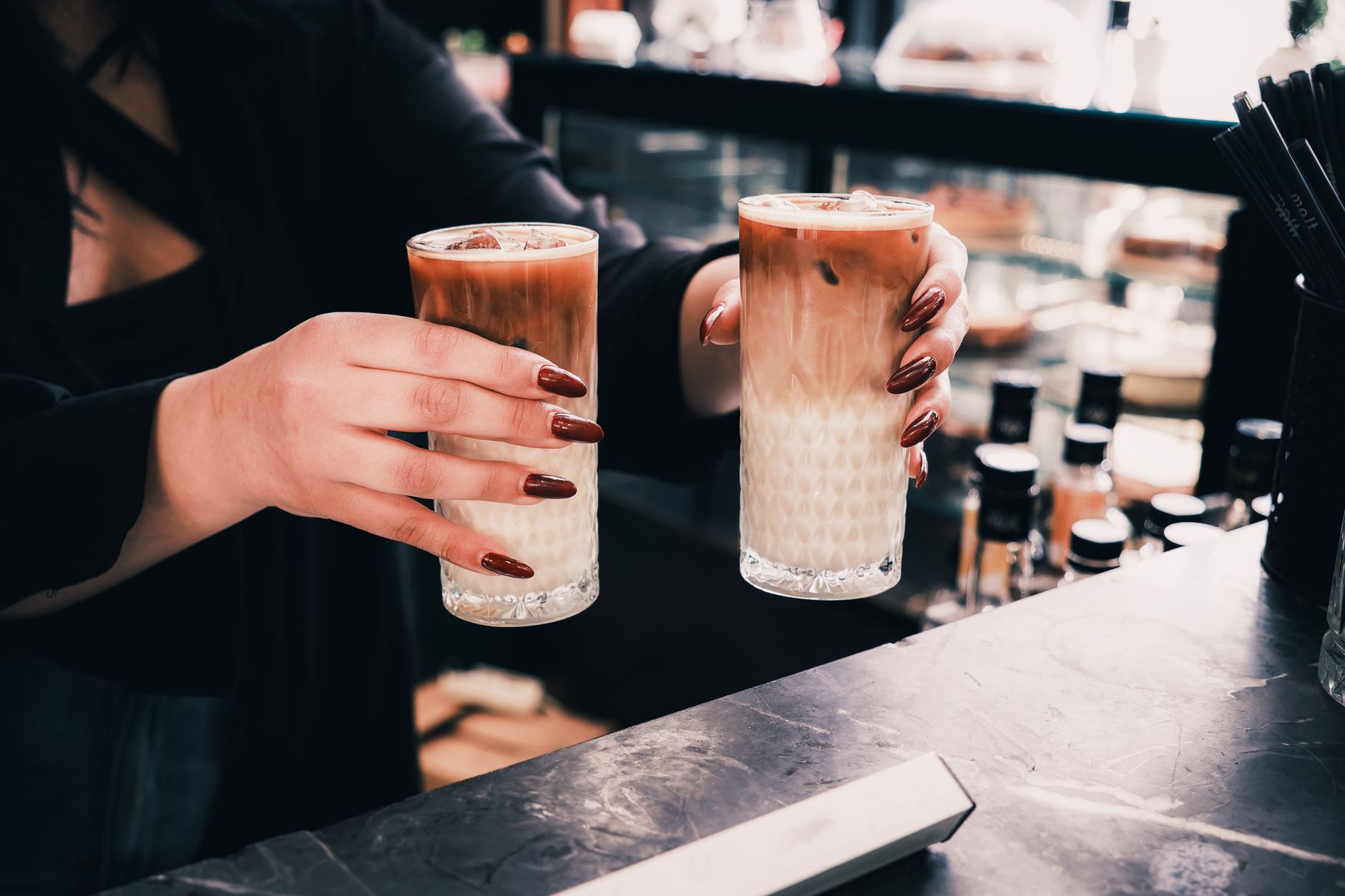 Luxury hotel coffee bar with latte art station and premium equipment