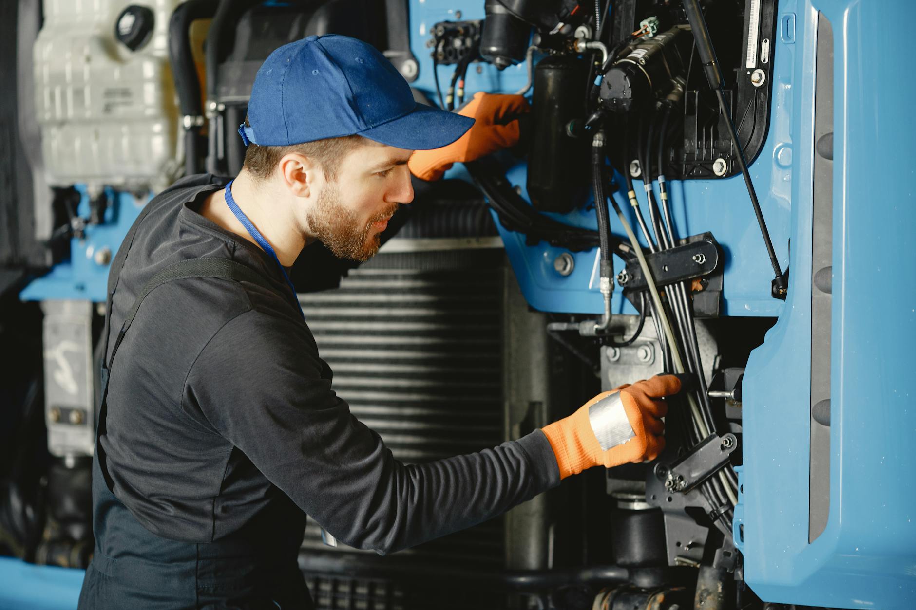 Coffee technician repairing espresso machine