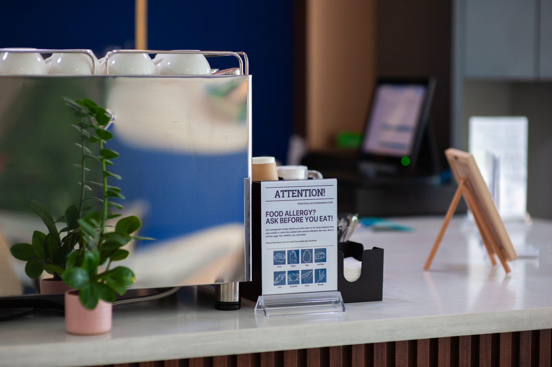 Barista workspace with essential accessories in a commercial kitchen