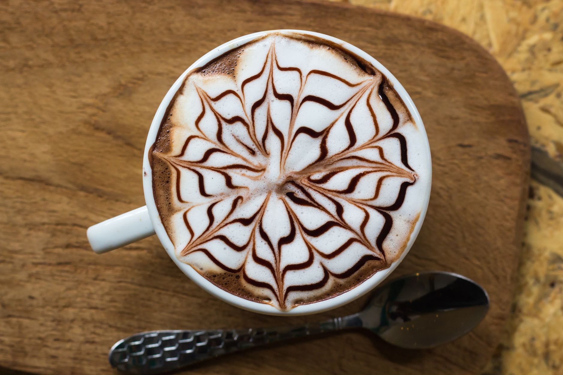 Professional barista preparing Cuban coffee in Miami café