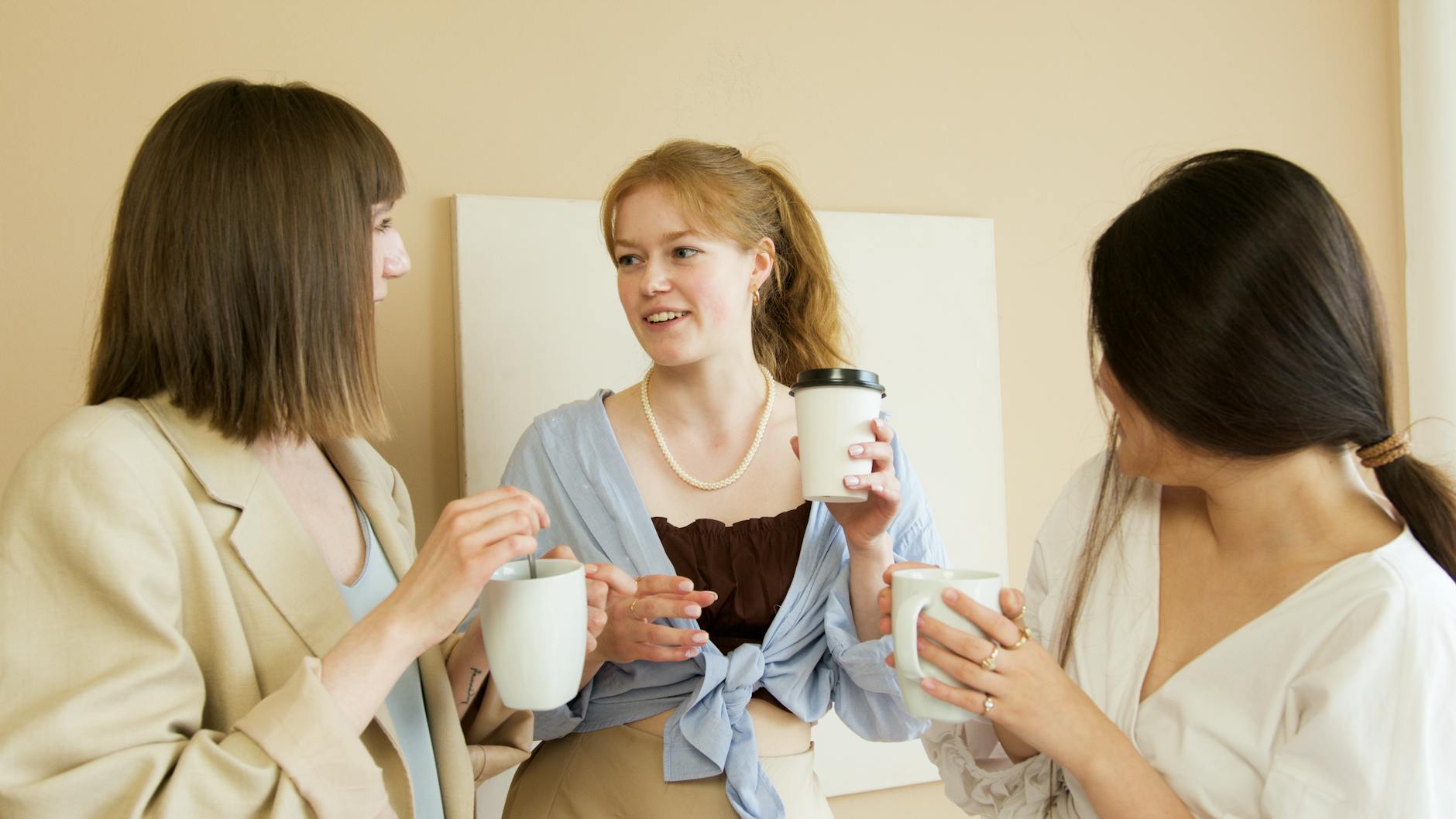 Busy Portland office team enjoying coffee break