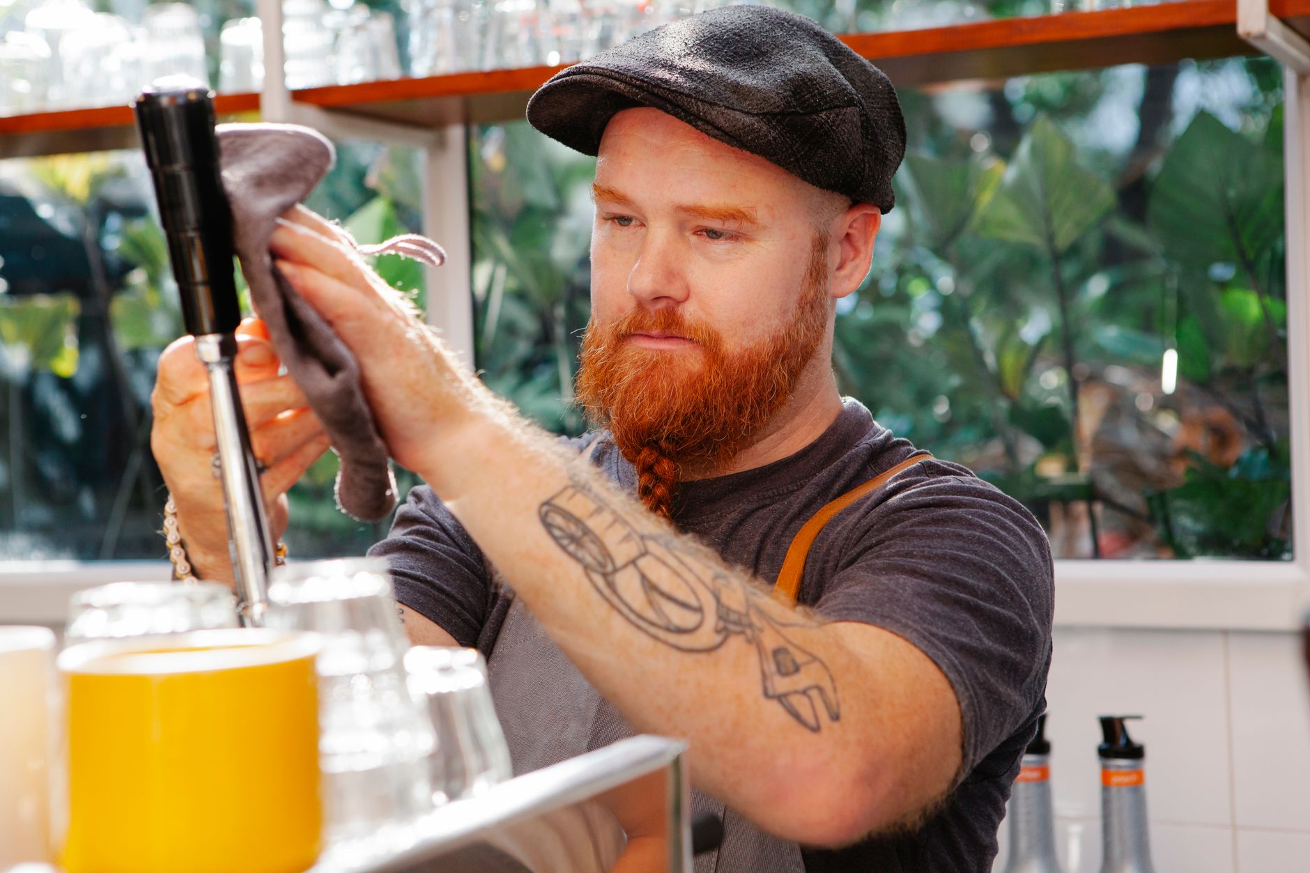 Certified technician performing professional maintenance on commercial espresso machine in Miami