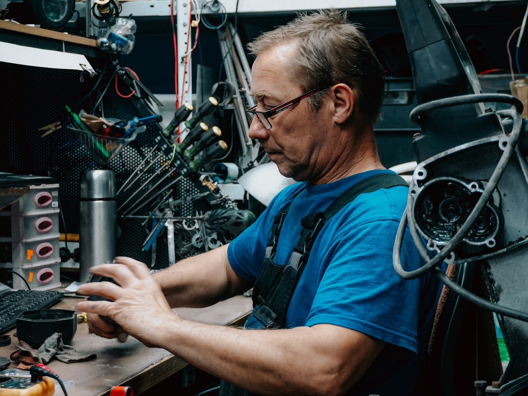 Certified technician performing maintenance on commercial coffee equipment