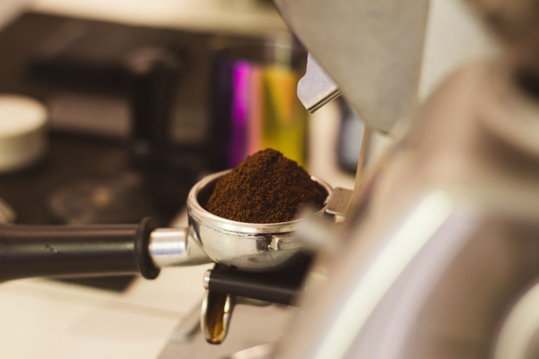 Certified technician performing maintenance on commercial coffee equipment