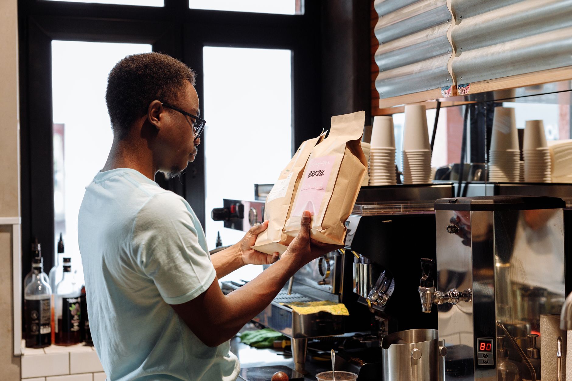 Hospitality staff participating in hands-on French press training session
