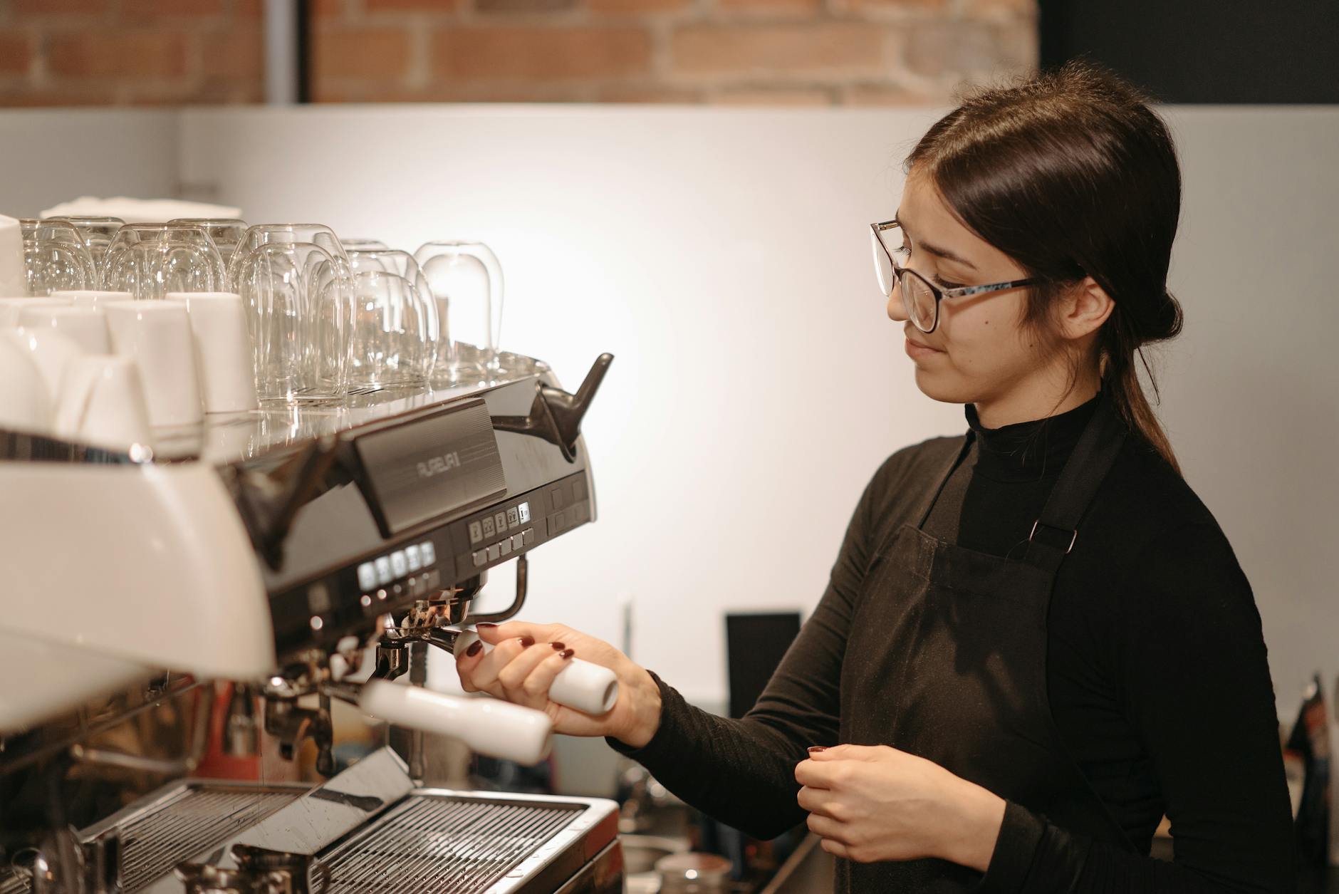 Accountant calculating ROI on coffee equipment