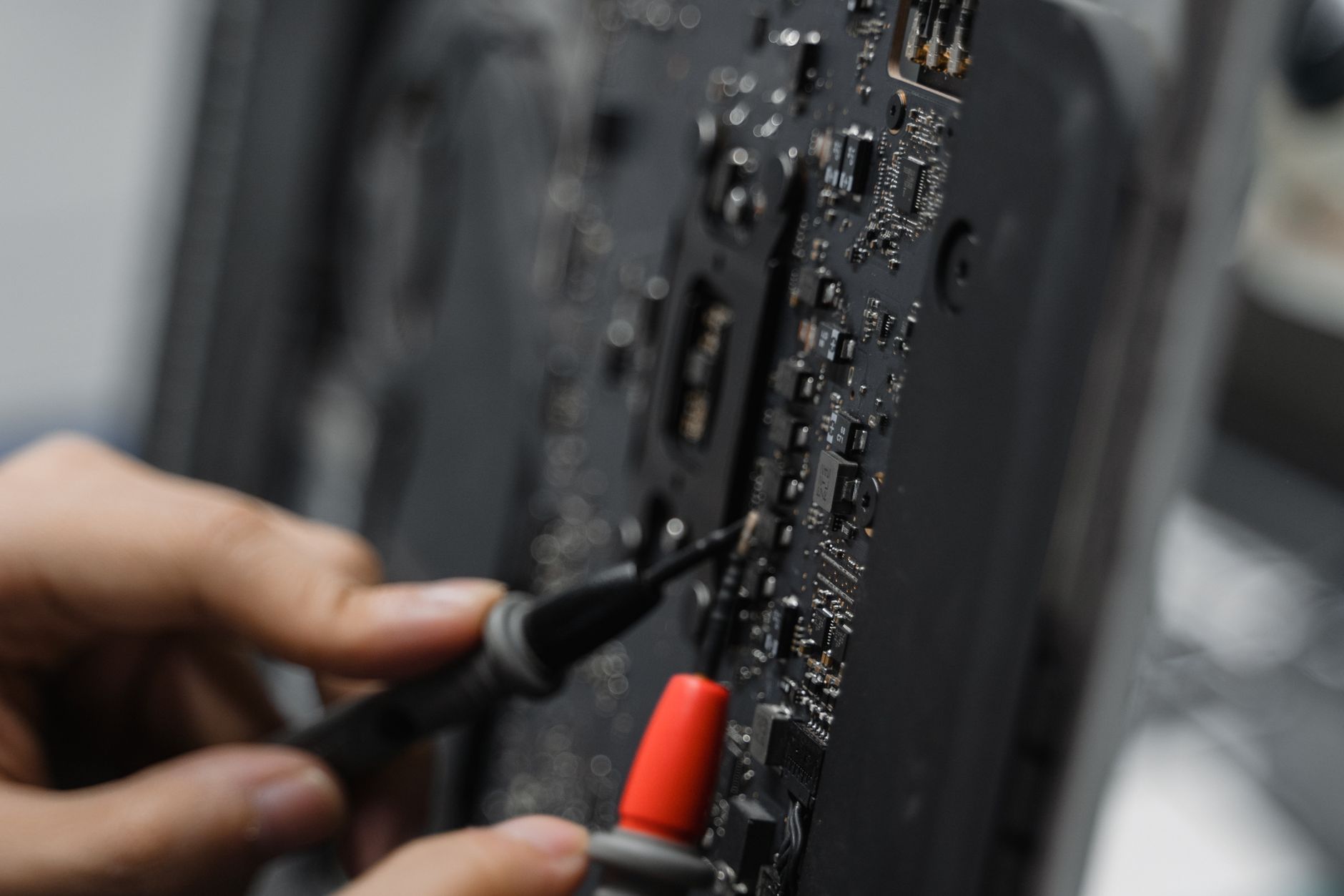 Certified technician performing preventive maintenance on commercial espresso machine