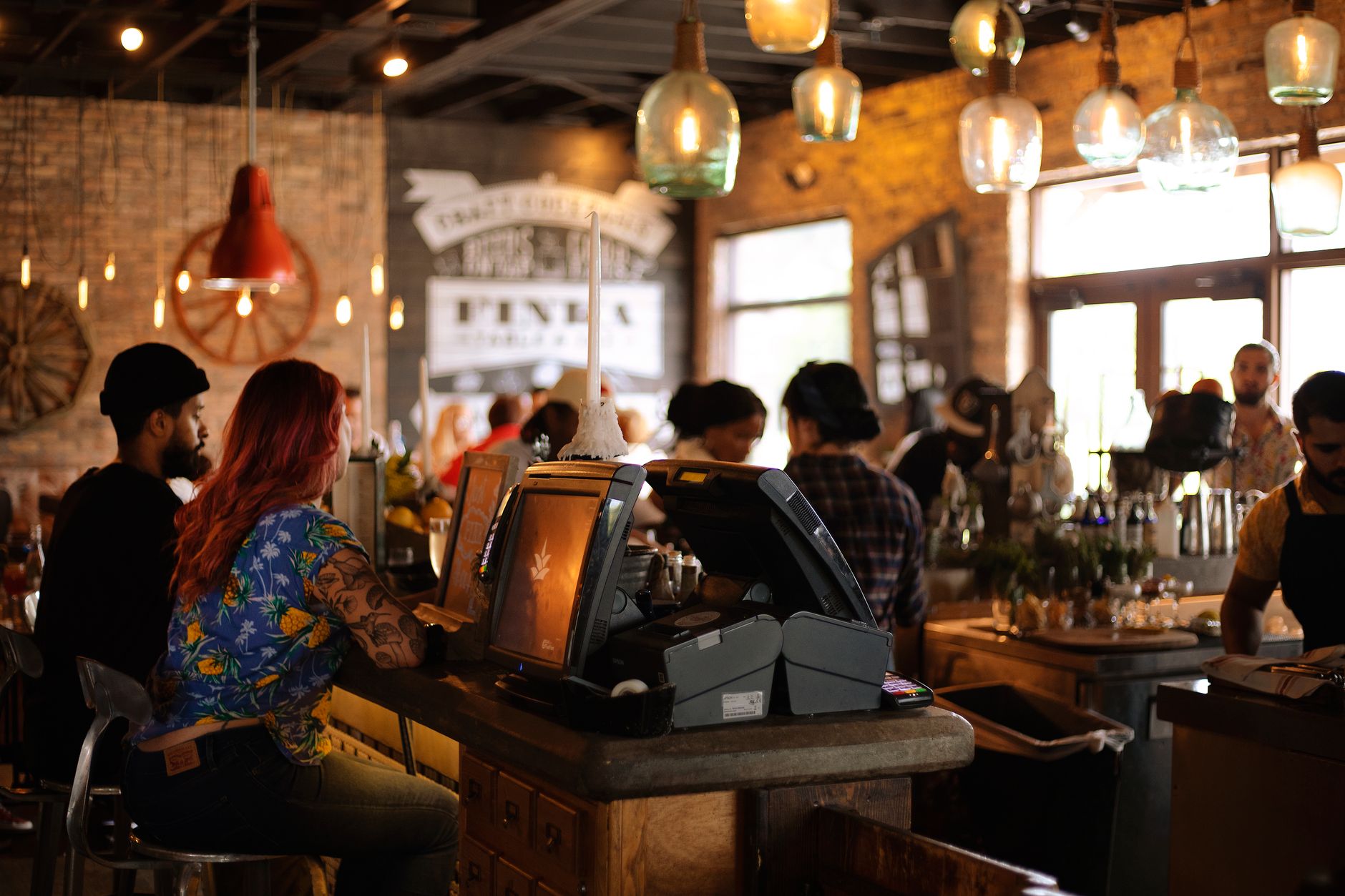 Barista preparing coffee at a busy restaurant in Columbus Ohio