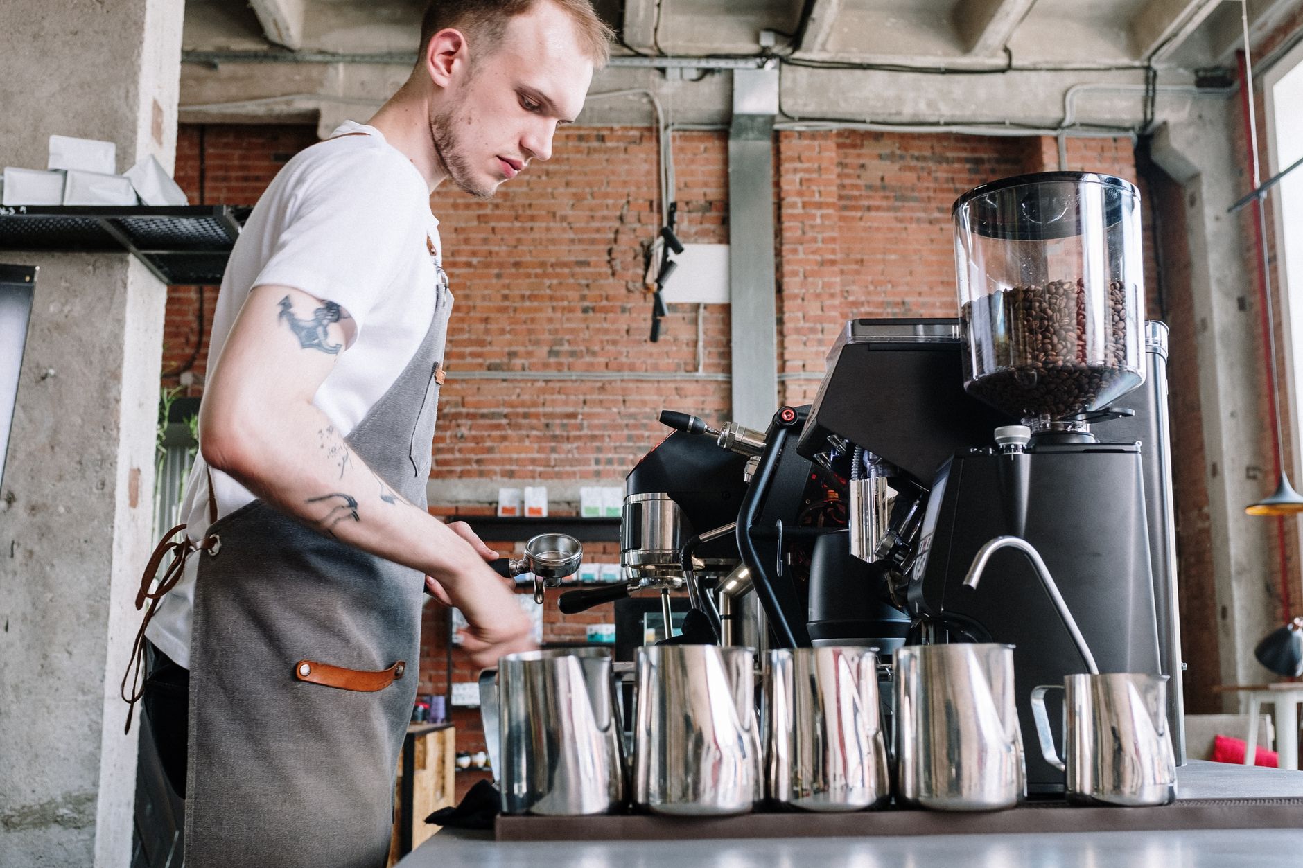 Certified technician performing precision calibration on Las Vegas coffee equipment