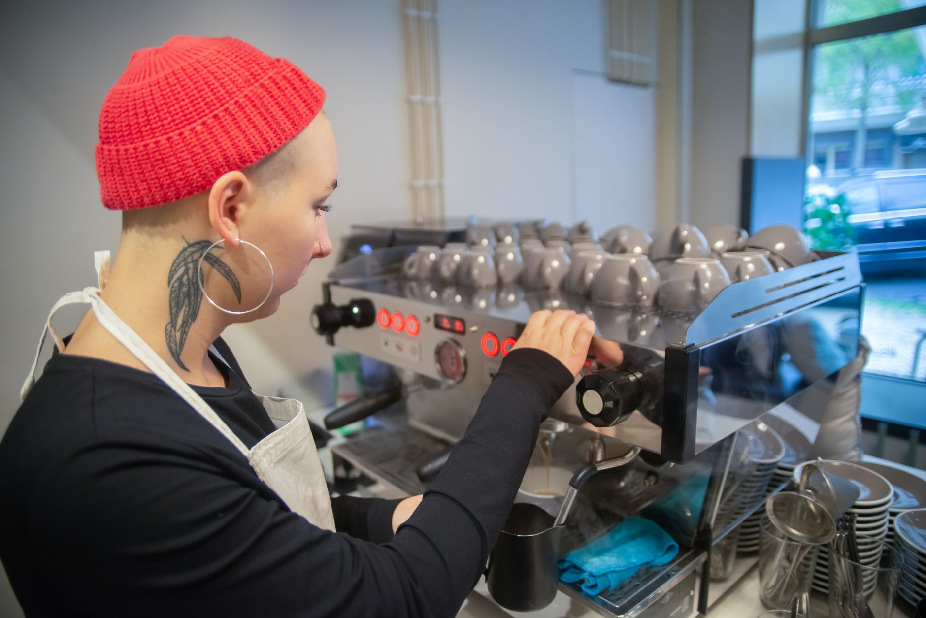 Professional technician servicing a commercial espresso machine in Orlando