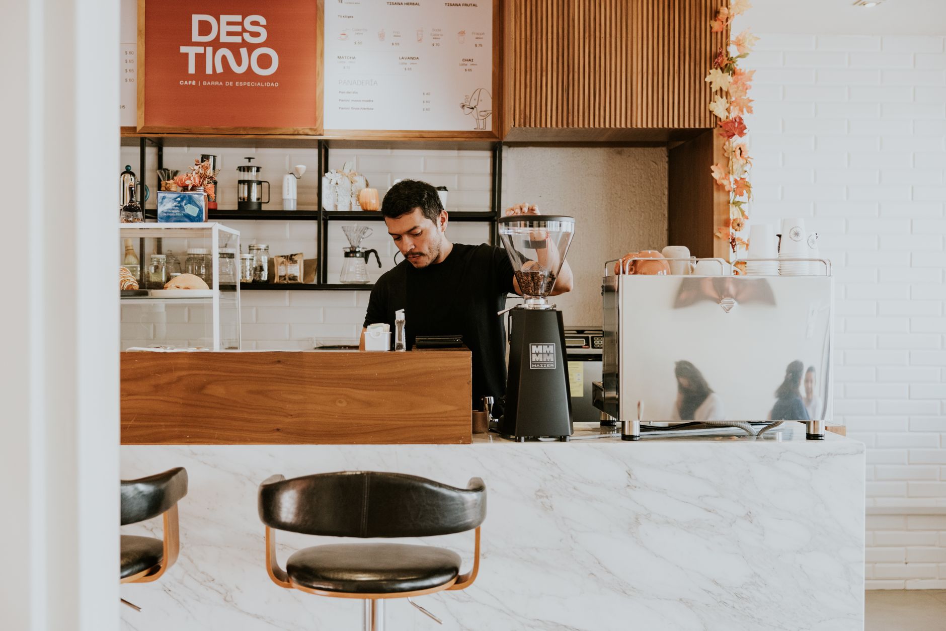 Professional espresso station with dosing funnel, tamper, and knock box
