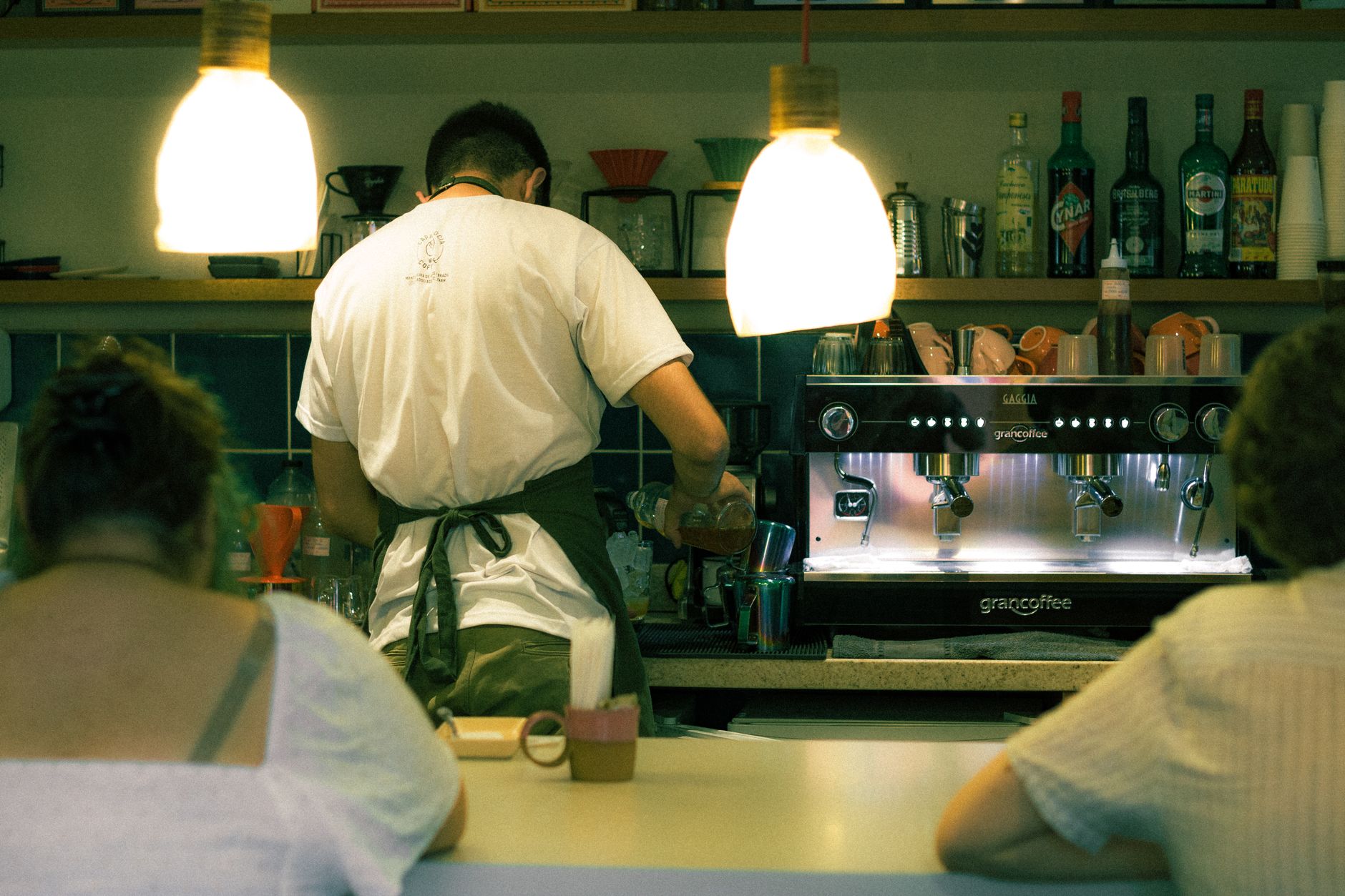 Busy Las Vegas hotel coffee bar with guests queuing during morning rush