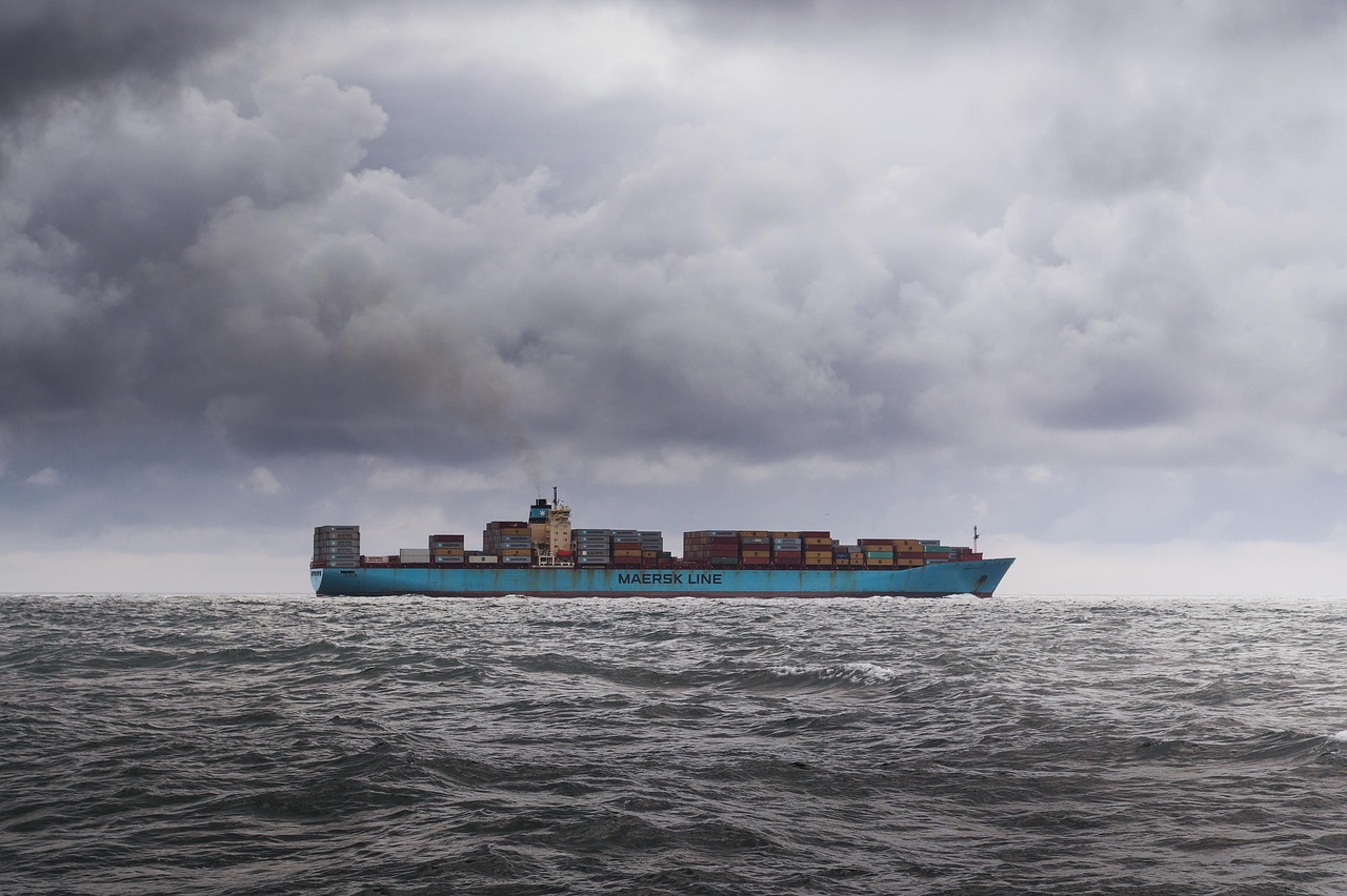 container, ship, blue sky, sky, clouds, dark, weather, raining, wild, rough, blue, shipping container, cargo, export, freight, industry, transportation, transport, shipping, harbor, business, industrial, trade, storage, goods, sea, import, bulk, dock, loading, logistics, commerce, international, terminal, gray business, nature, gray sky, gray rain, gray sea, gray dark, gray company, gray industry