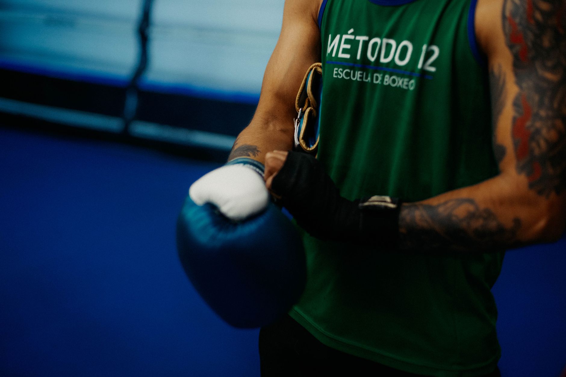 A boxer getting ready for training at a boxing school in Buenos Aires, Argentina.