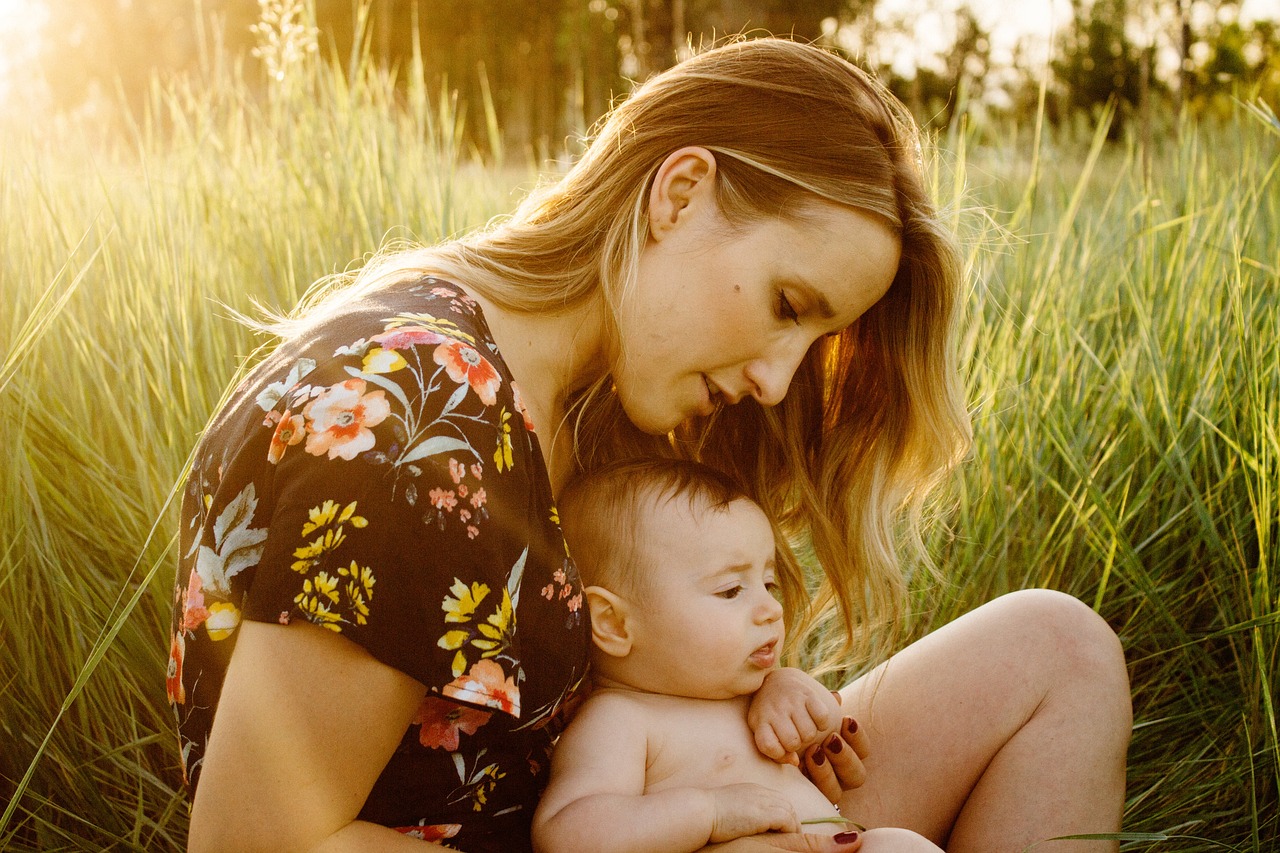 mother, baby, child, field, motherhood, parent, parenthood, infant, family, girl, grass, love, woman, sit, sitting, outdoors, nature, happy mothers day, portrait, golden light, mum, mom