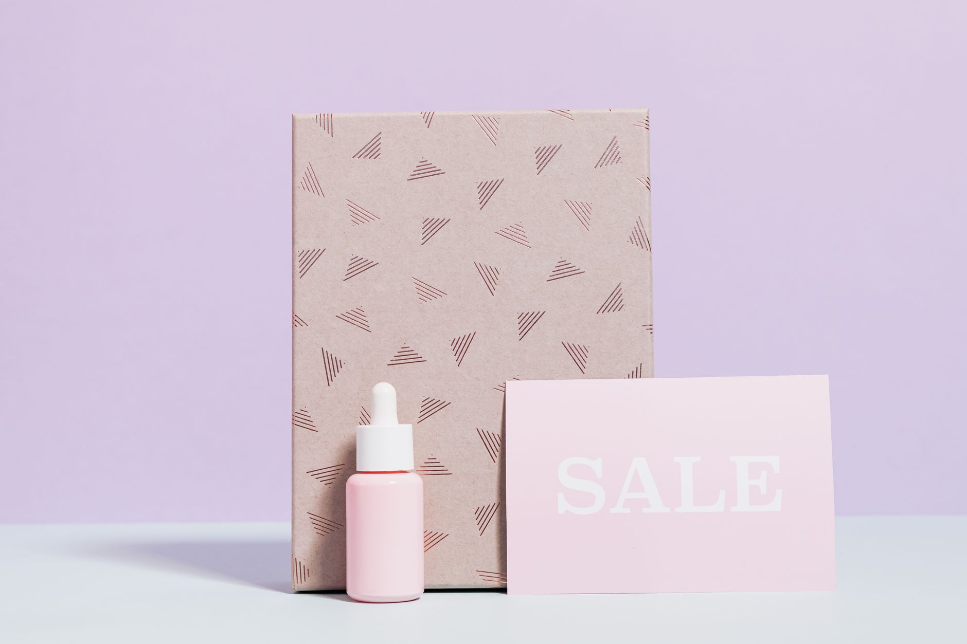 Chic skincare packaging with a prominent sale sign in a minimal design.