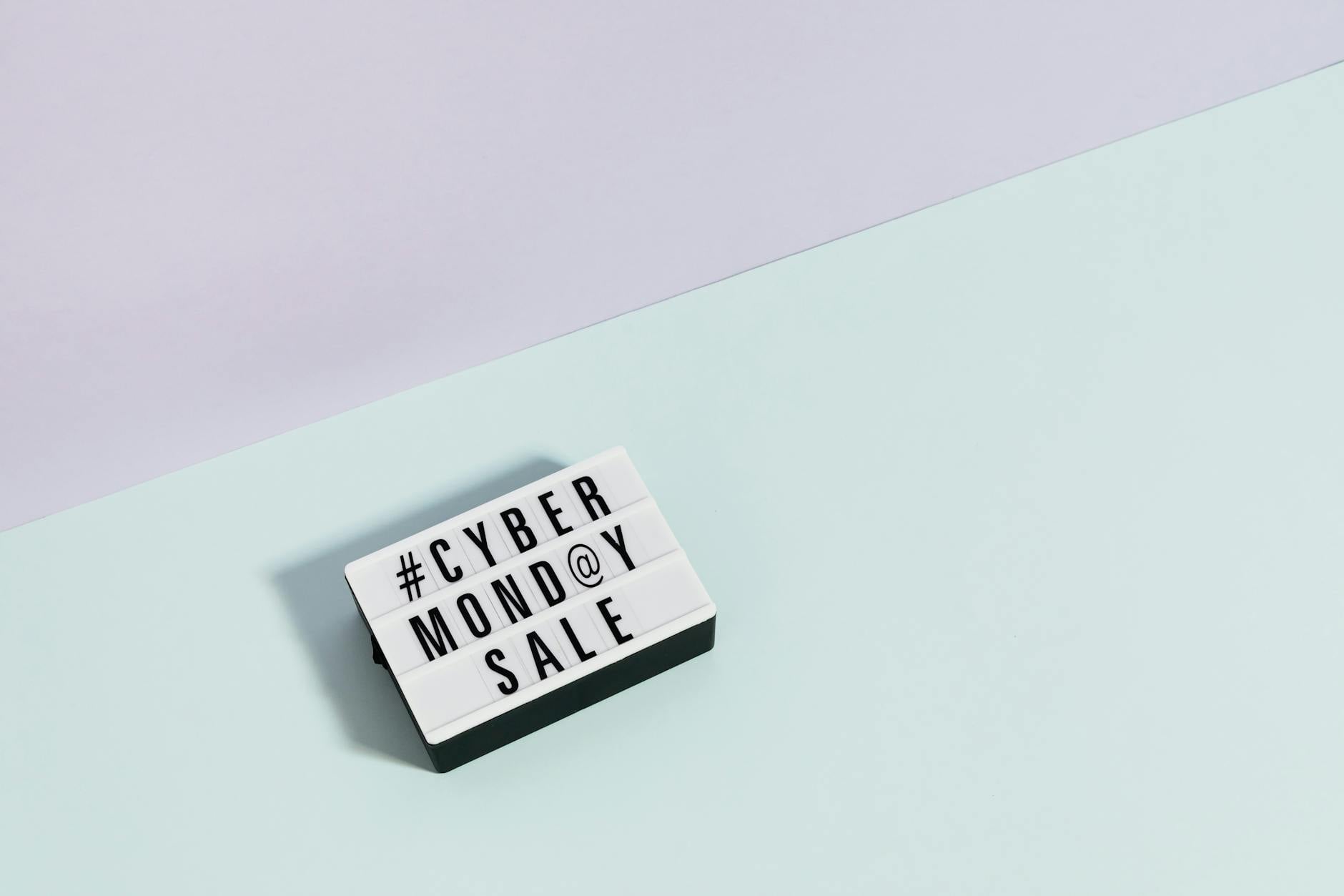 Modern minimalist image of Cyber Monday sale sign with pastel background.