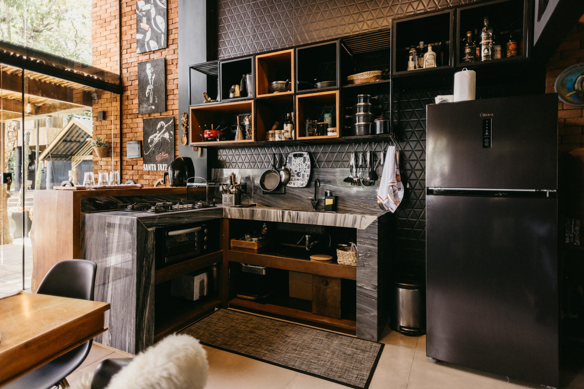 A stylish modern kitchen design featuring wooden accents and open shelving, perfect for home inspiration.