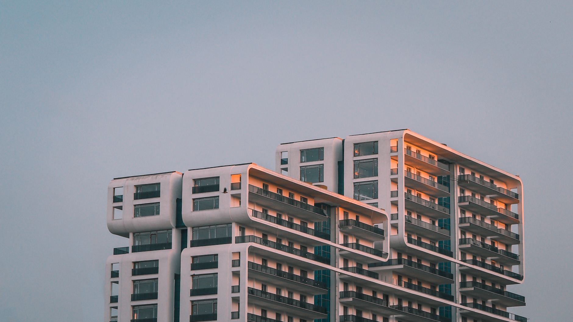 Stunning modern architectural building captured against a sunset sky in Samsun, Türkiye.