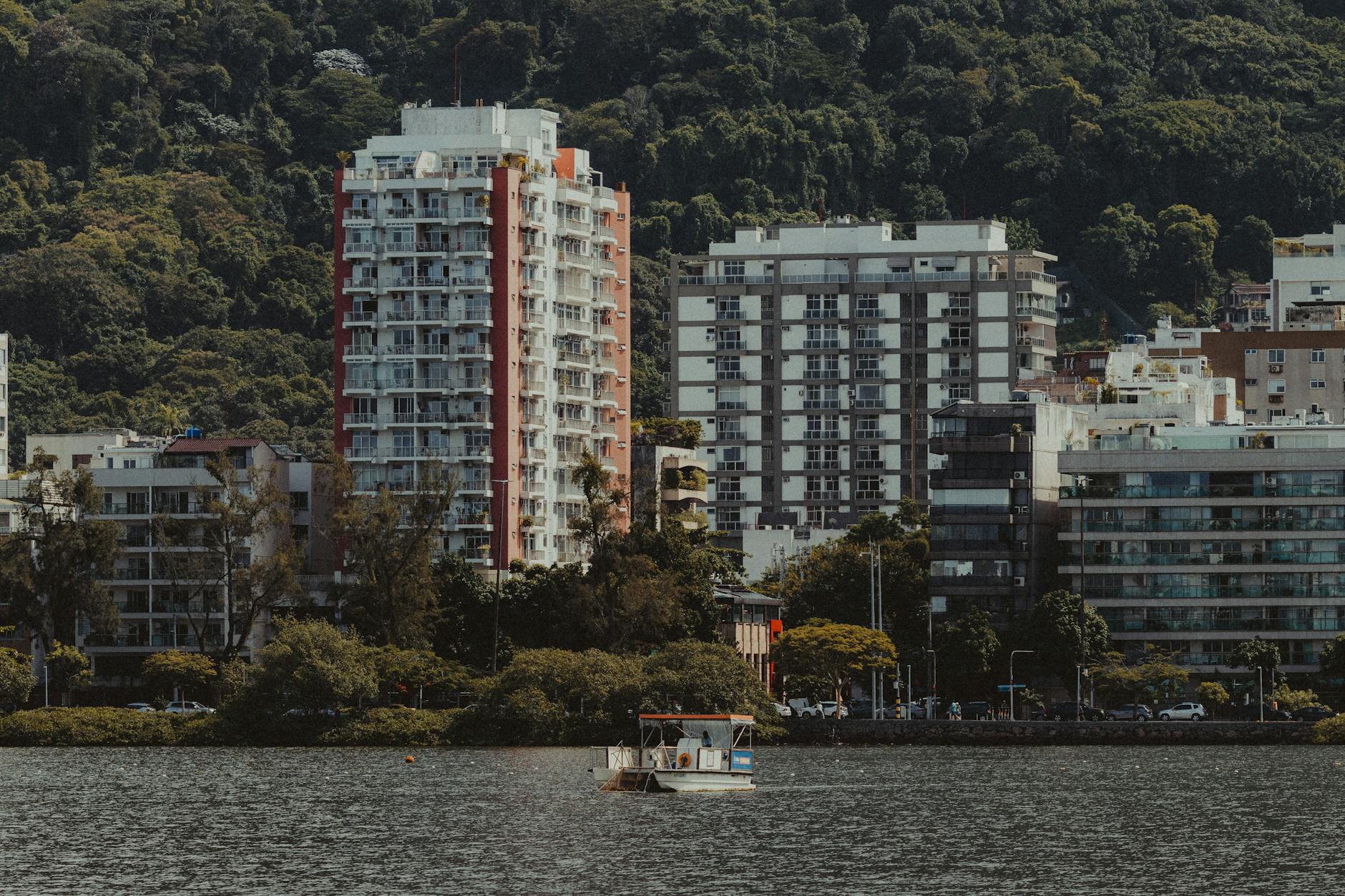 Explore the captivating skyline of Rio de Janeiro, featuring lush mountains and urban architecture.