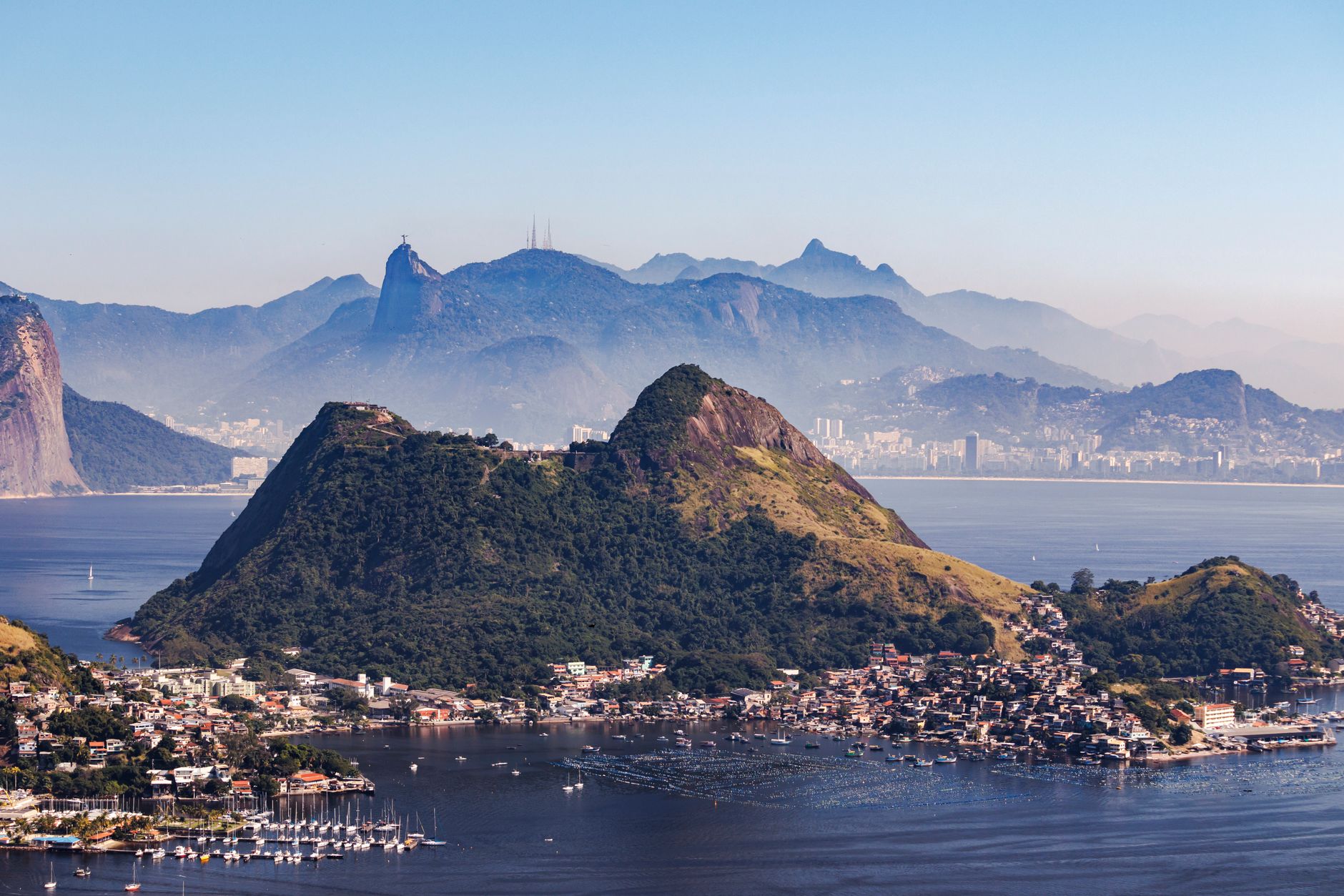 Stunning aerial view of Niterói, Brazil with Sugarloaf Mountain and scenic coastlines.