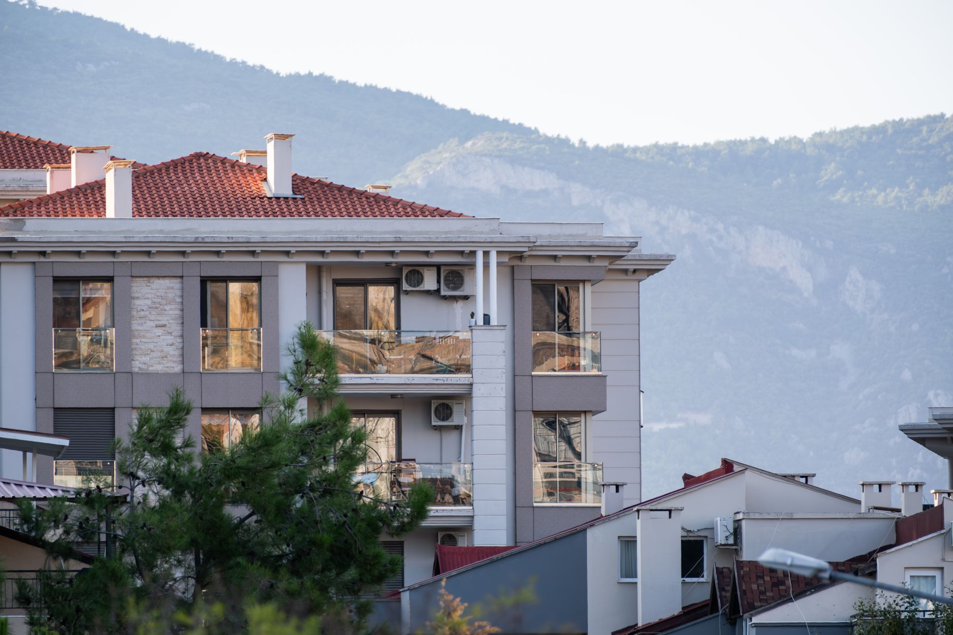 Contemporary apartments with mountain backdrop in Bornova, İzmir, Türkiye.