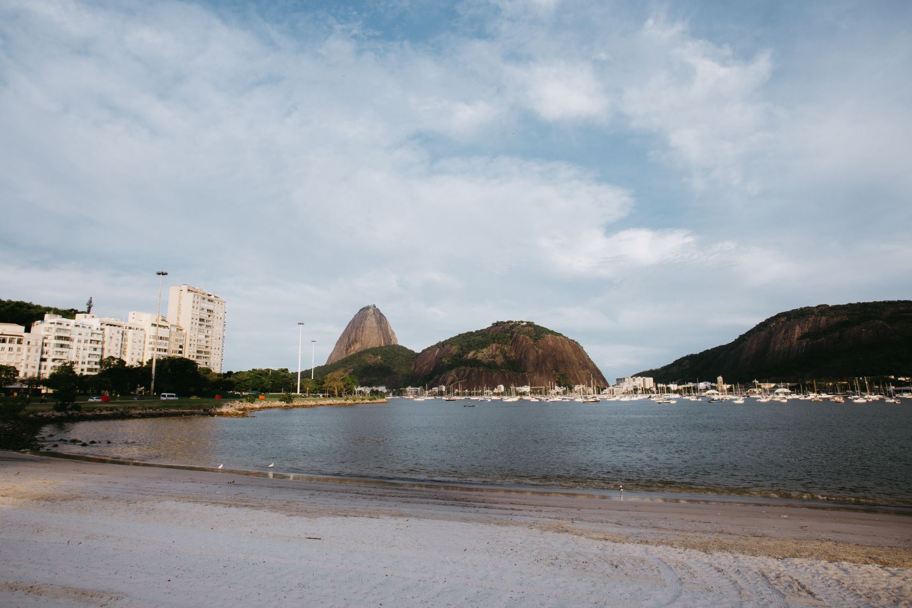 Beautiful view of Sugarloaf Mountain and Botafogo Bay in Rio de Janeiro, Brasil captured during the day.
