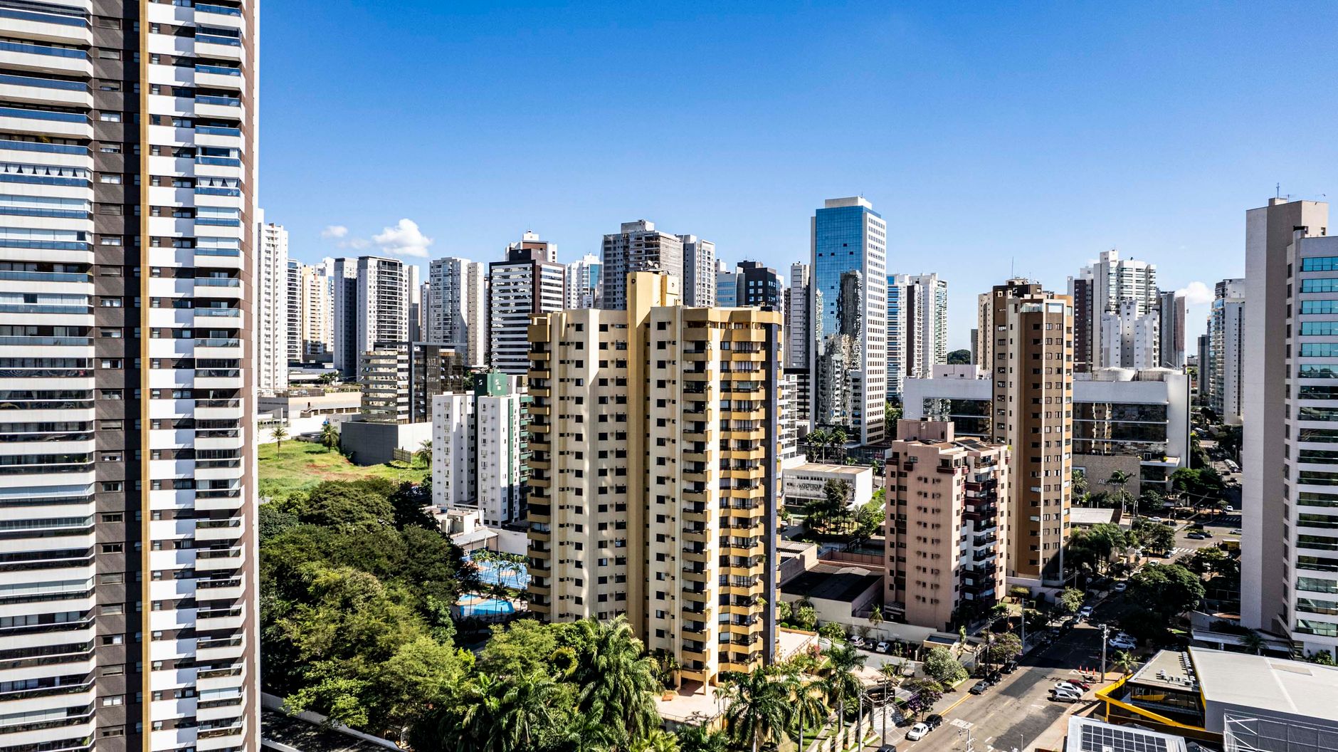 Aerial view of the modern skyscrapers in Londrina, Brazil, under clear blue skies.