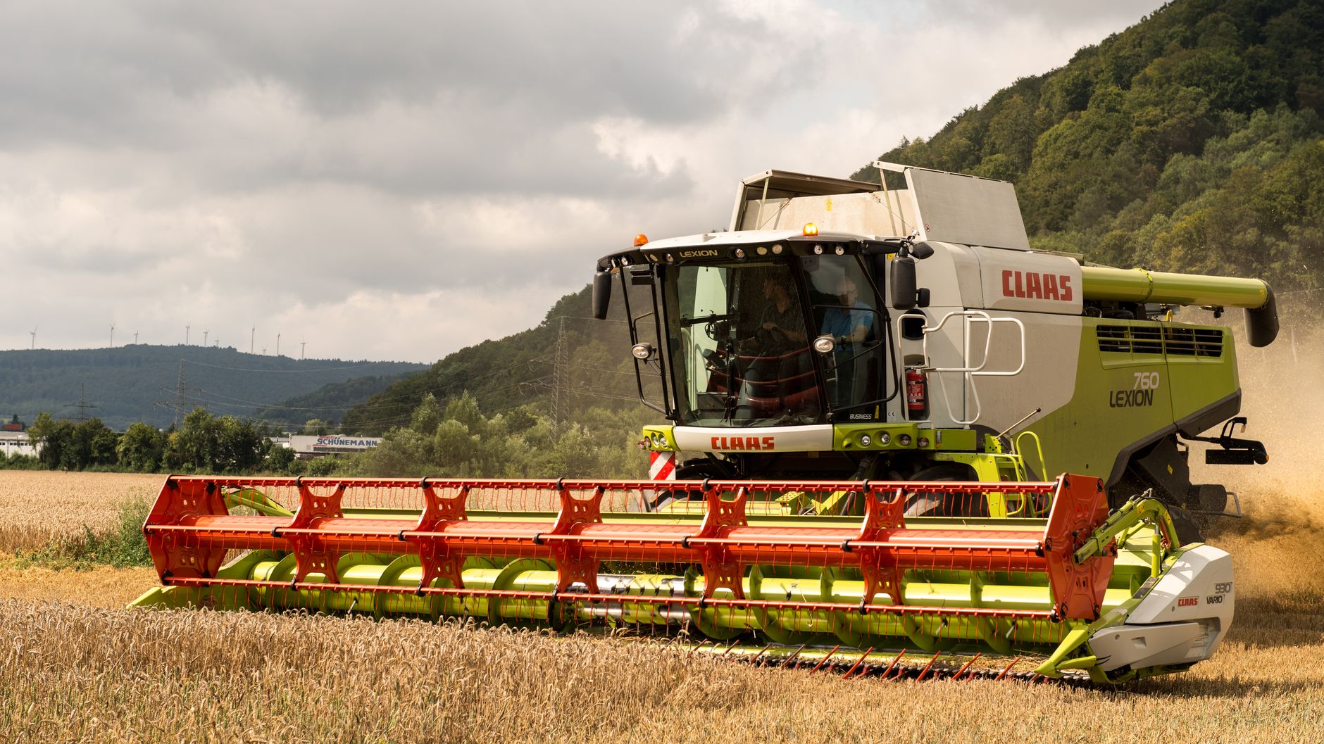 Combine harvester operating in a wheat field in Höxter, Germany during summer.