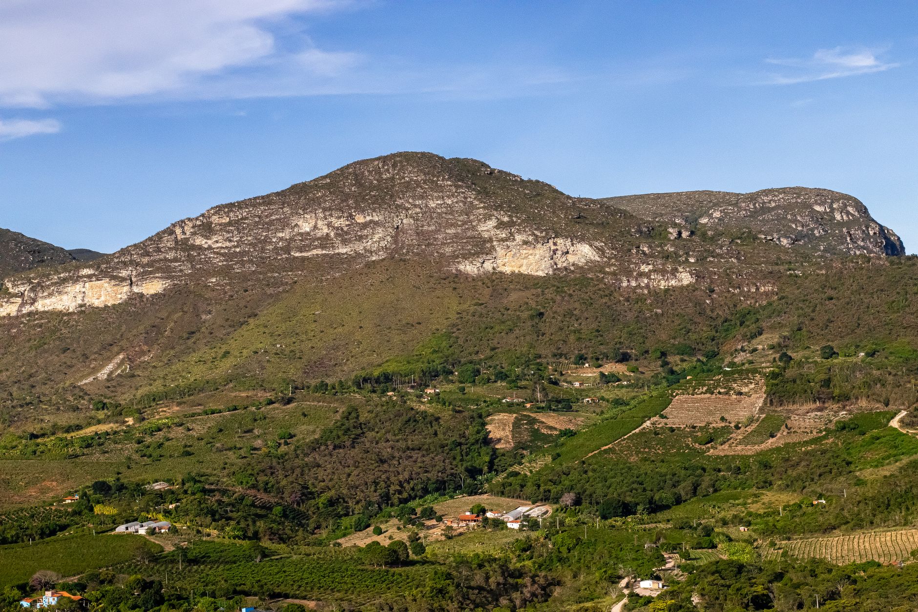 Breathtaking view of Chapada Diamantina's rugged landscape in Ibicoara, Brazil showcasing lush valleys and majestic mountains.