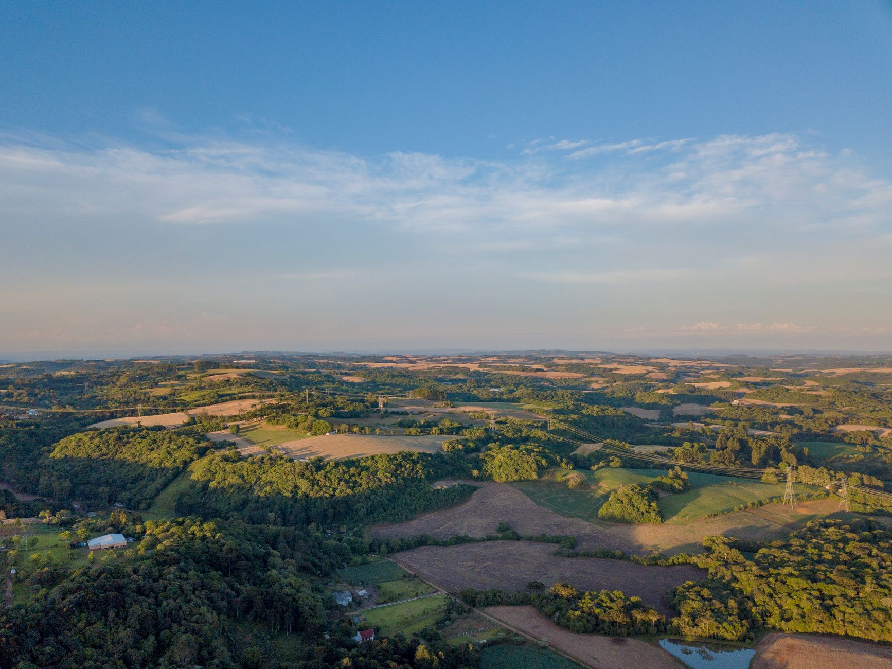 Aerial photograph showcasing the natural beauty and landscape of Erechim, RS, Brazil during daylight.