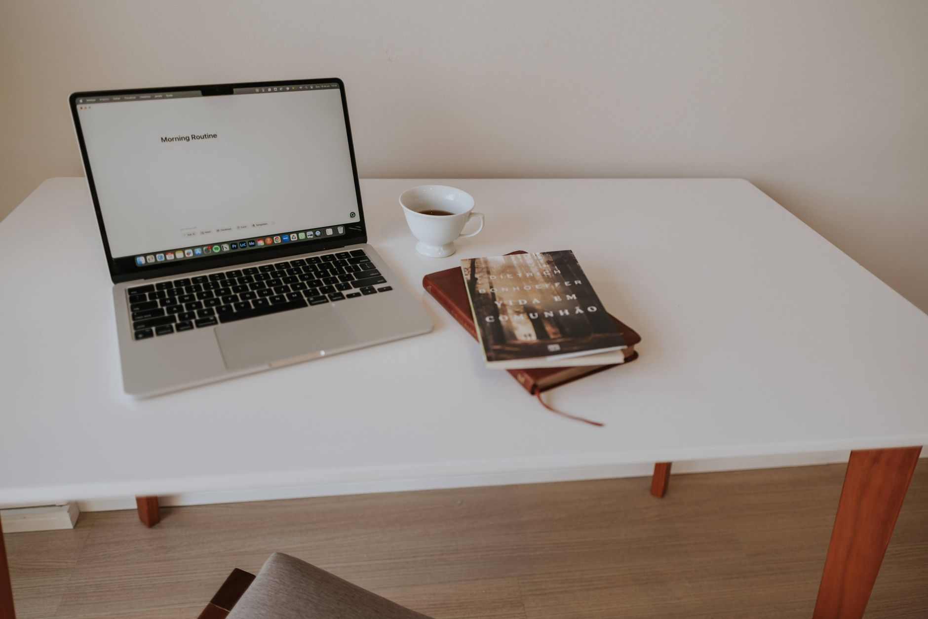 Business person using time management software on laptop