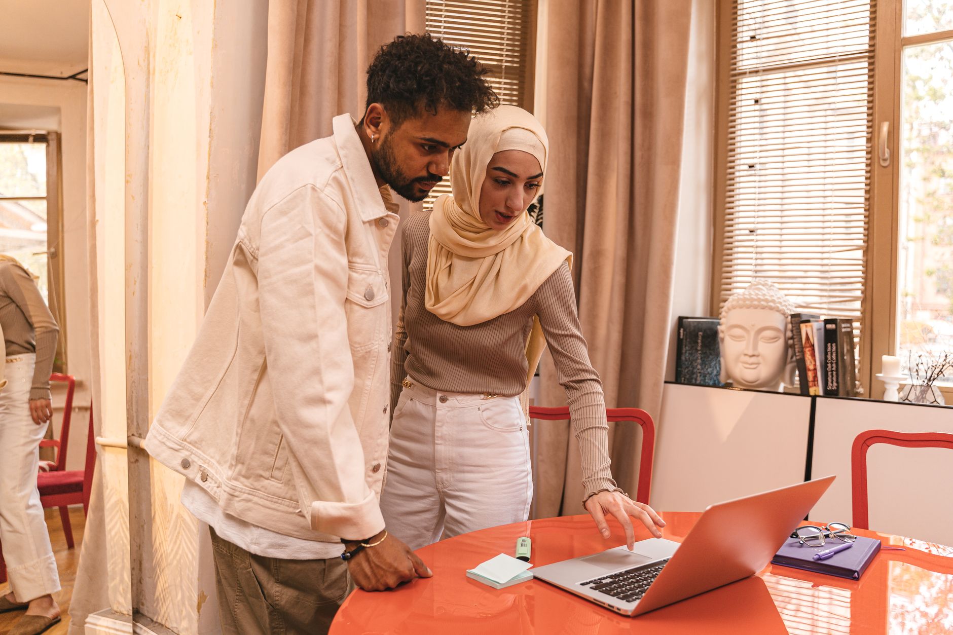 Diverse team planning projects using cloud-based task management software