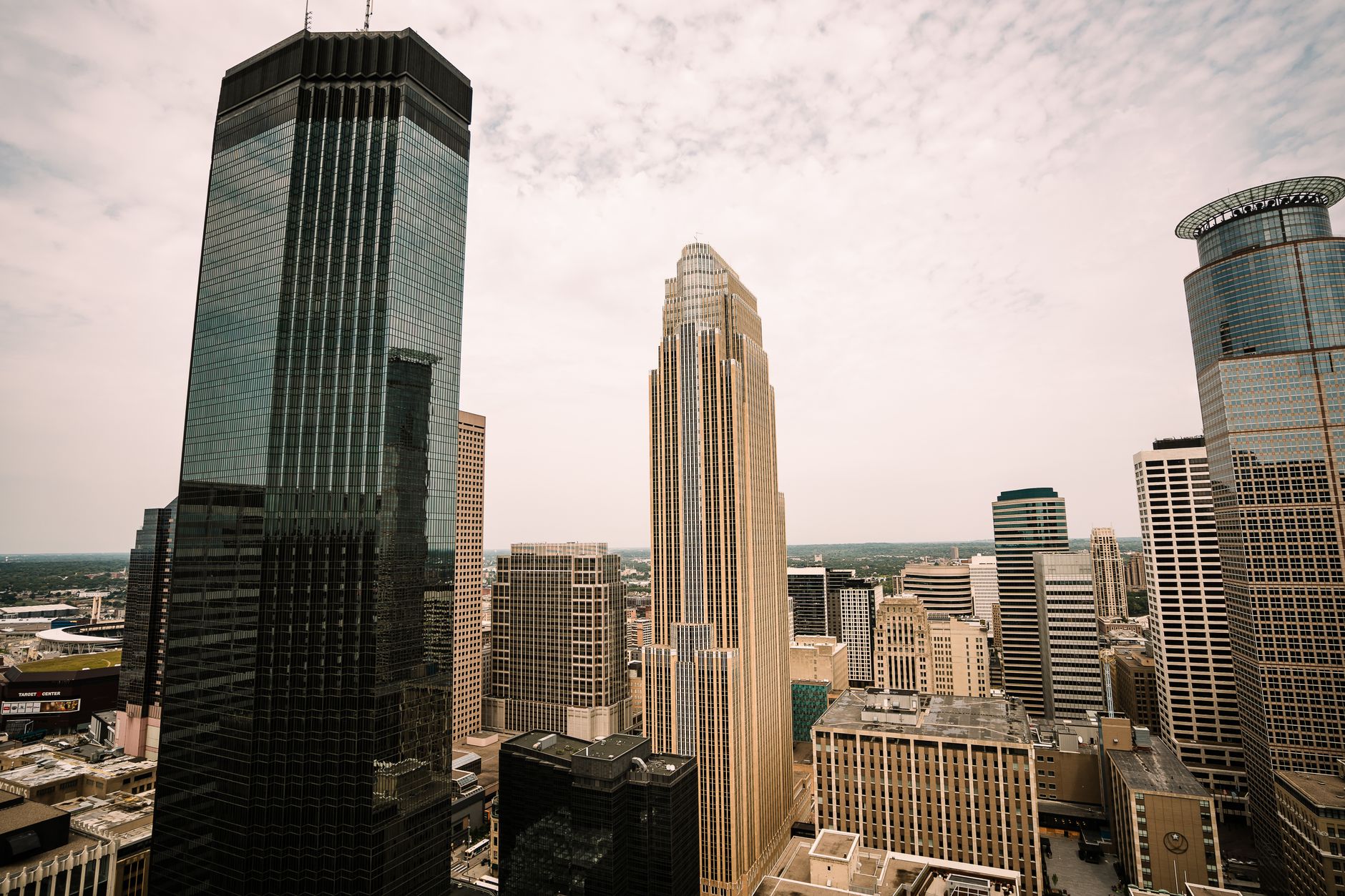 Modern office buildings in downtown Tulsa with professionals working